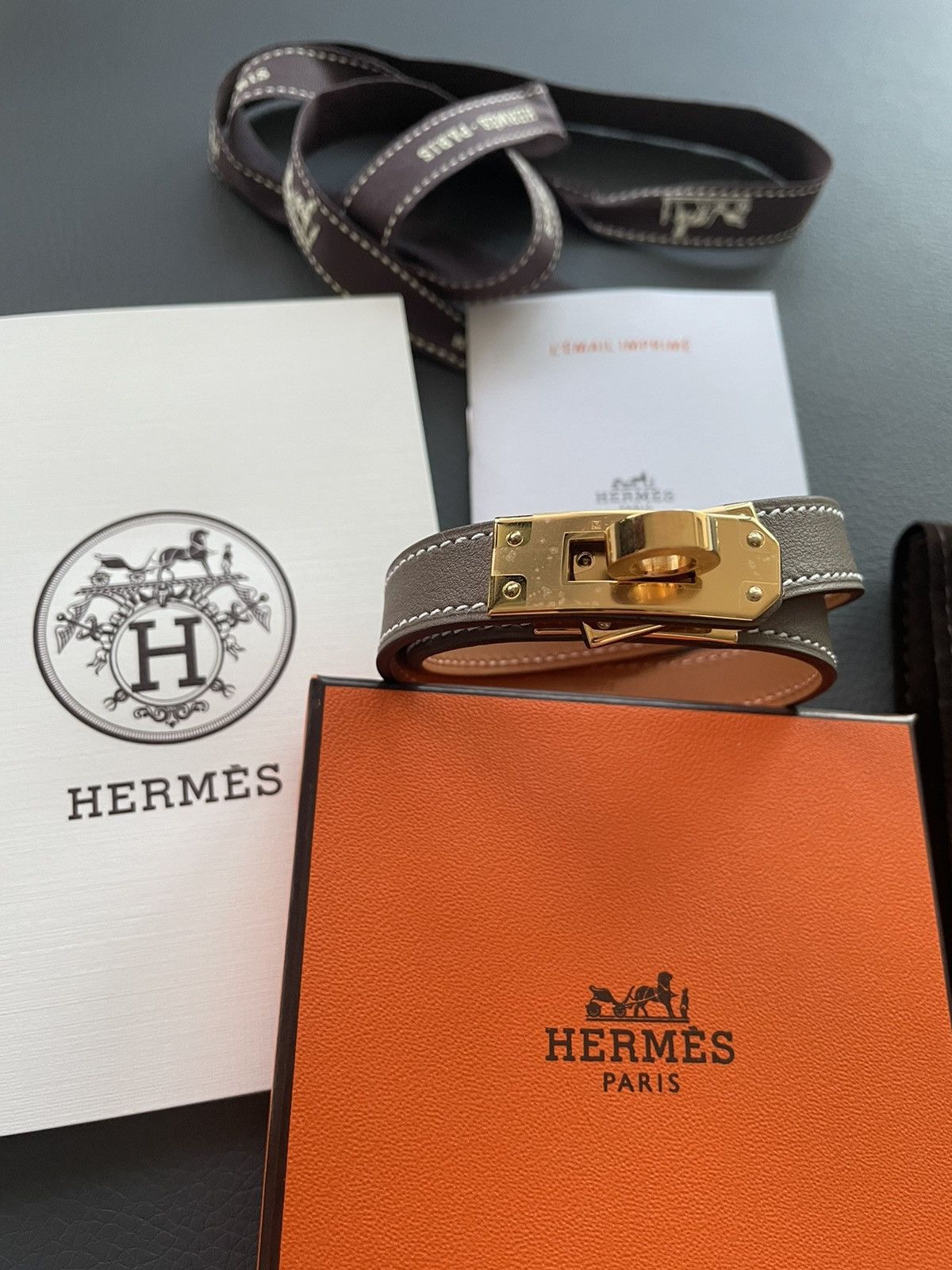 image of Hermes Iconic Classic Gold Kelly Leather Double Bracelet in Grey, Men's