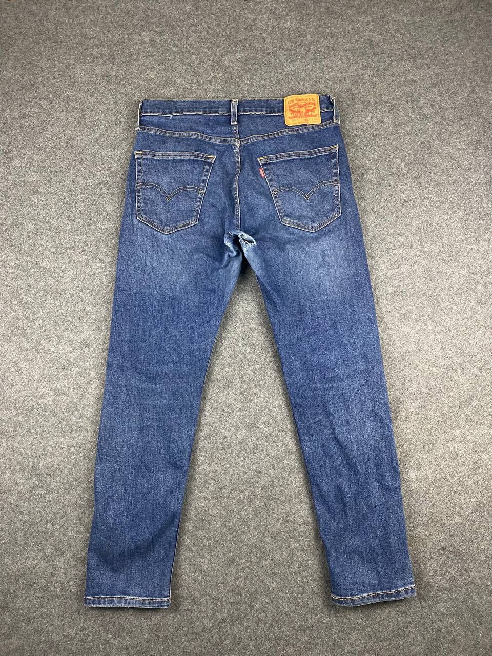 image of 502 Regular Tapered Distressed Denim, Men's (Size 34)