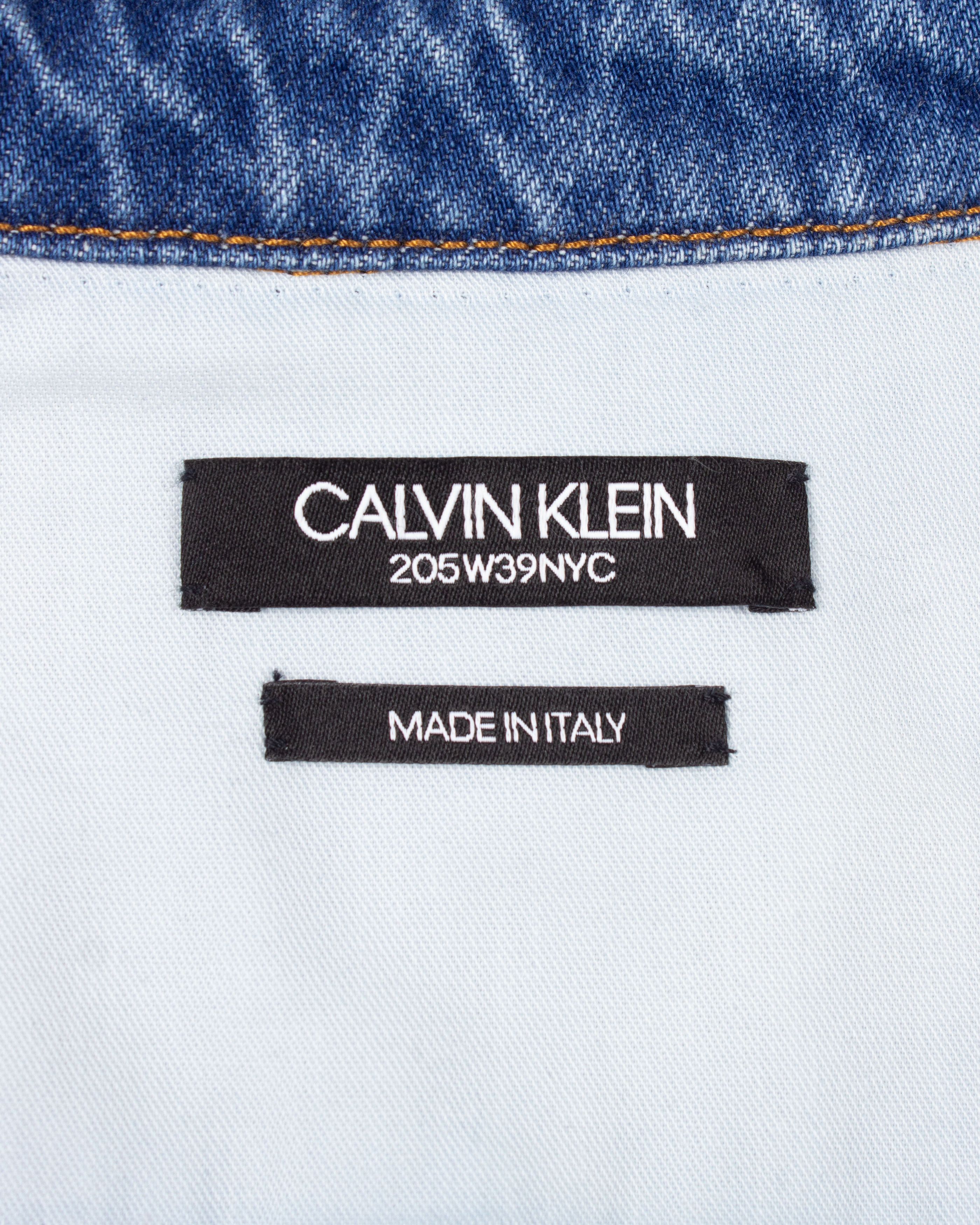 CK205W39NYC BY RAF SIMONS Reflective Denim Jacket