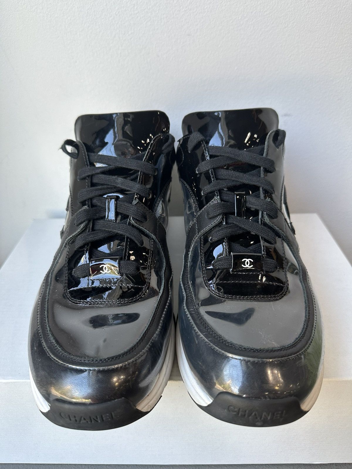 triple white chanel sneakers