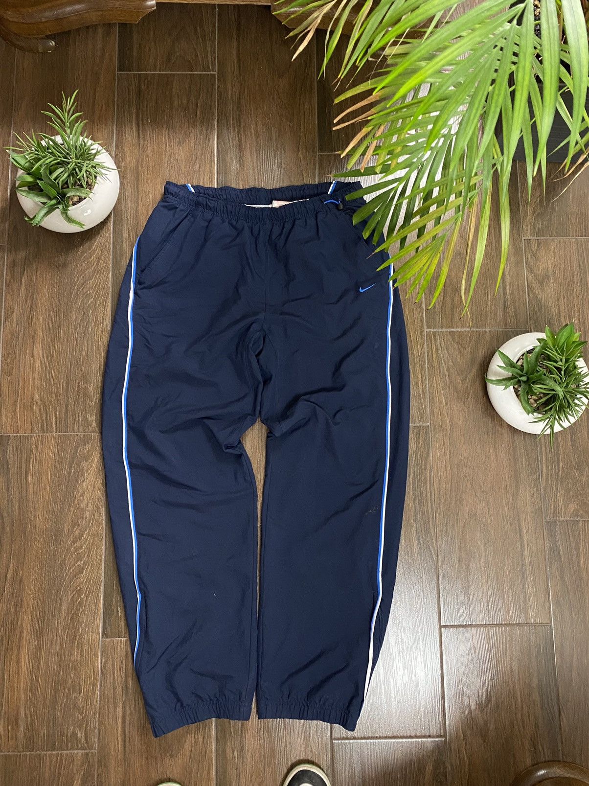 90’s NIKE Swoosh Navy Blue Nylon Athletic Track Ankle Zip Jogger Pants Size Large main image 1