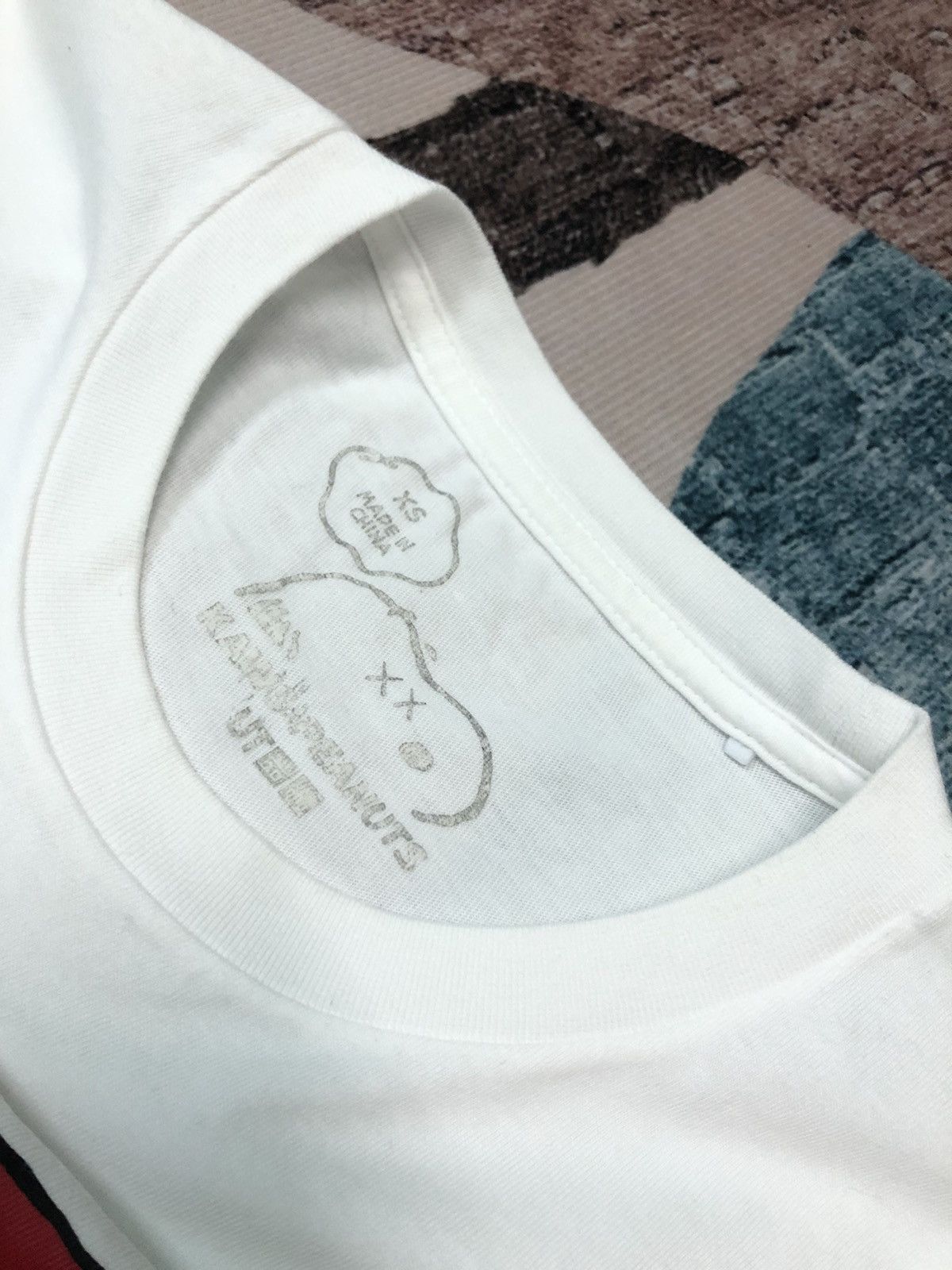 Kaws × Peanuts × Uniqlo KAWS x SNOOPY x UNIQLO PHOTO SHIRT Size US S / EU 44-46 / 1 - 4 Thumbnail