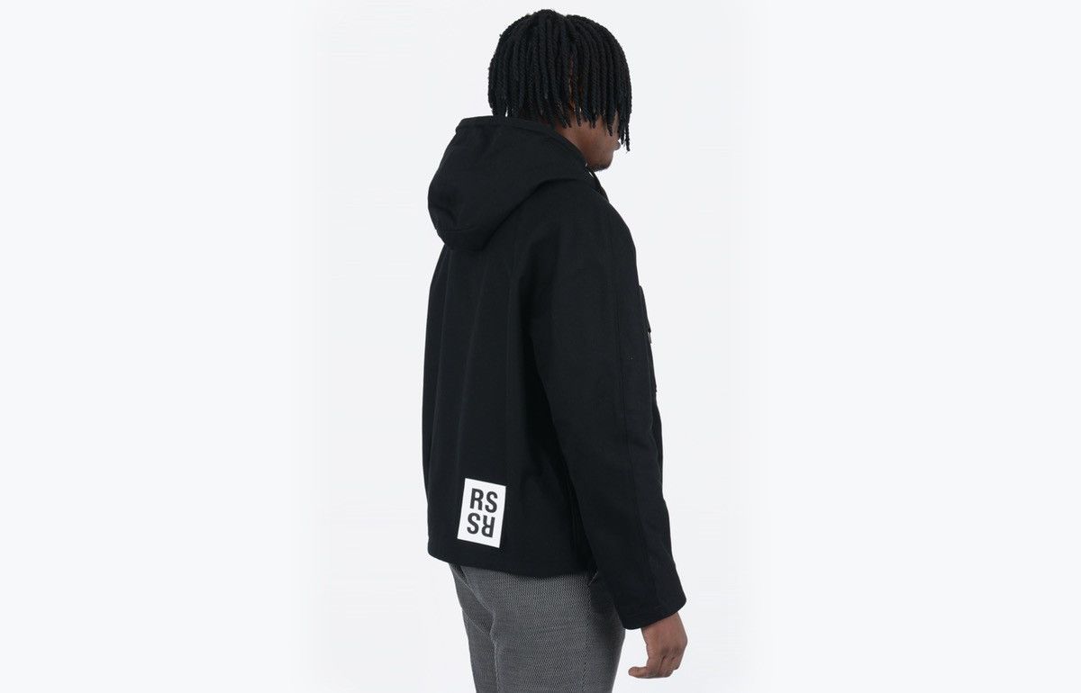 Raf Simons Black short hooded jacket with patch | Grailed