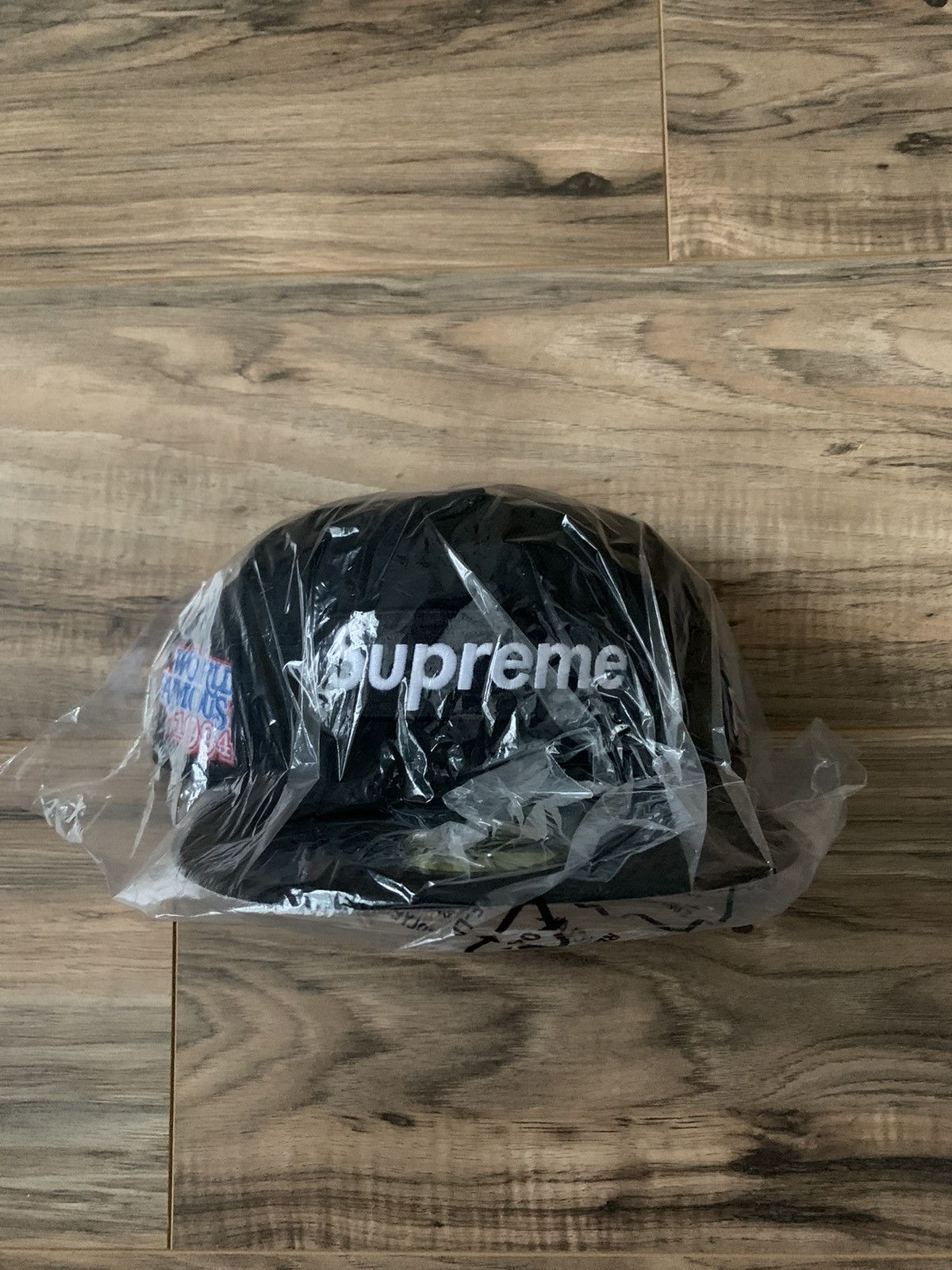 image of Supreme World Famous Box Logo New Era in Black, Men's