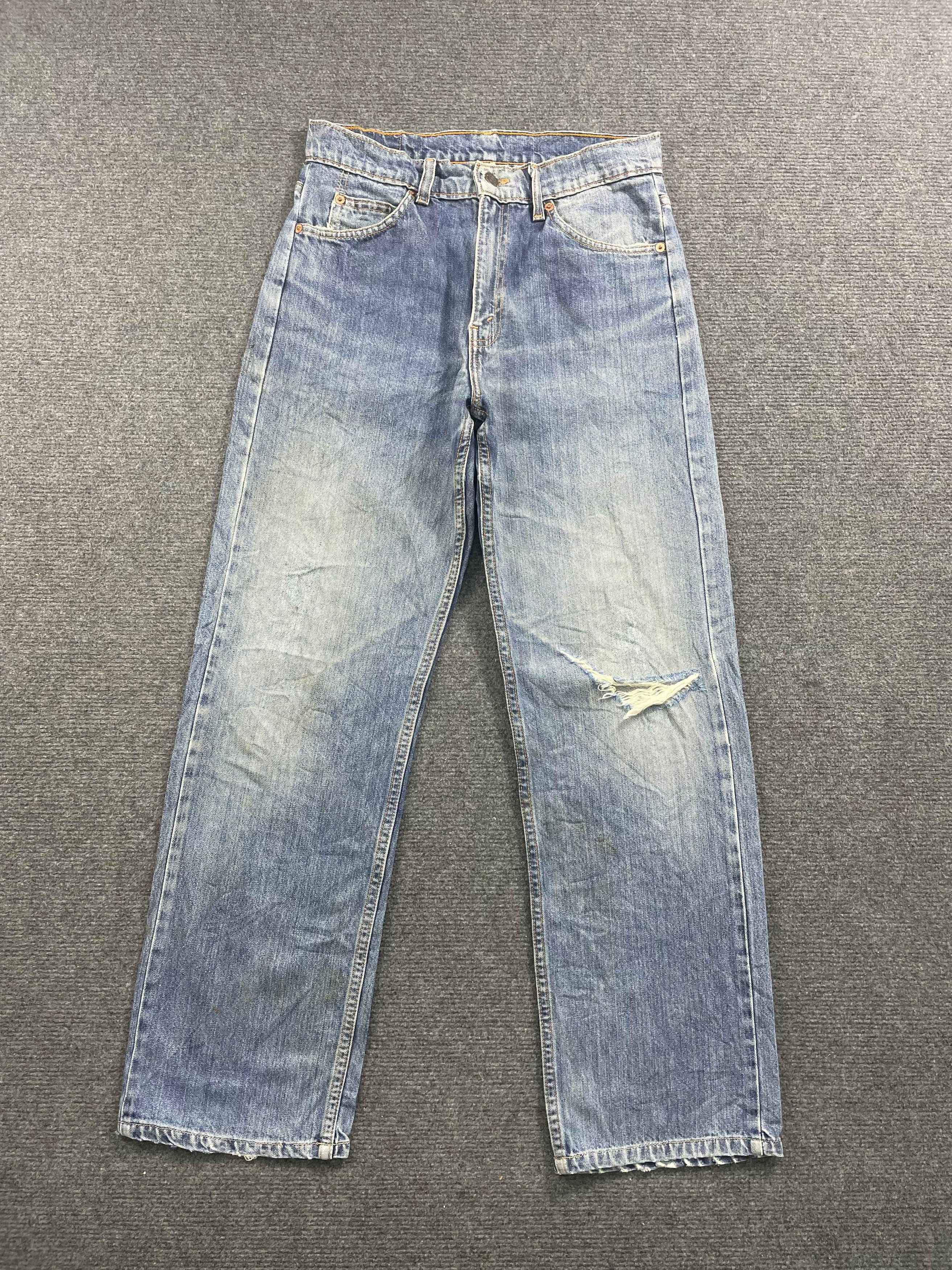image of 90's Levis 612 Orange Tab Faded Blue Jeans in Blue Denim, Men's (Size 29)