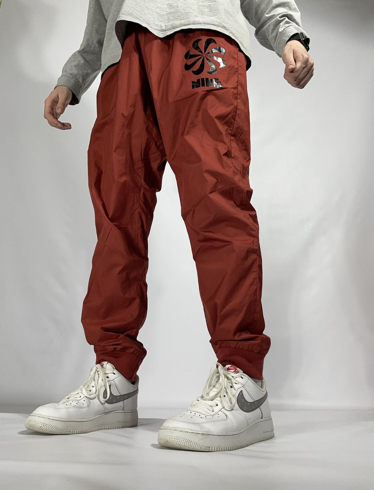 Nike nylon track pants orange colour
