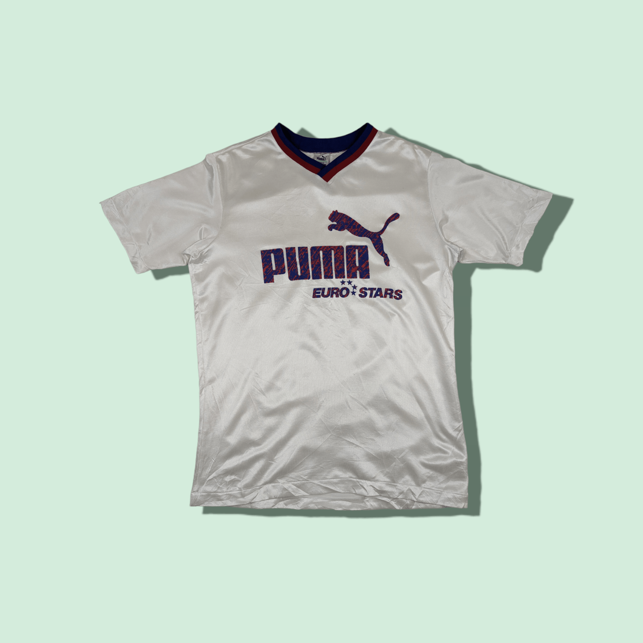 image of Vintage 90's Puma Big Spell Out Soccer Football Jersey in Silver, Men's (Size Large)