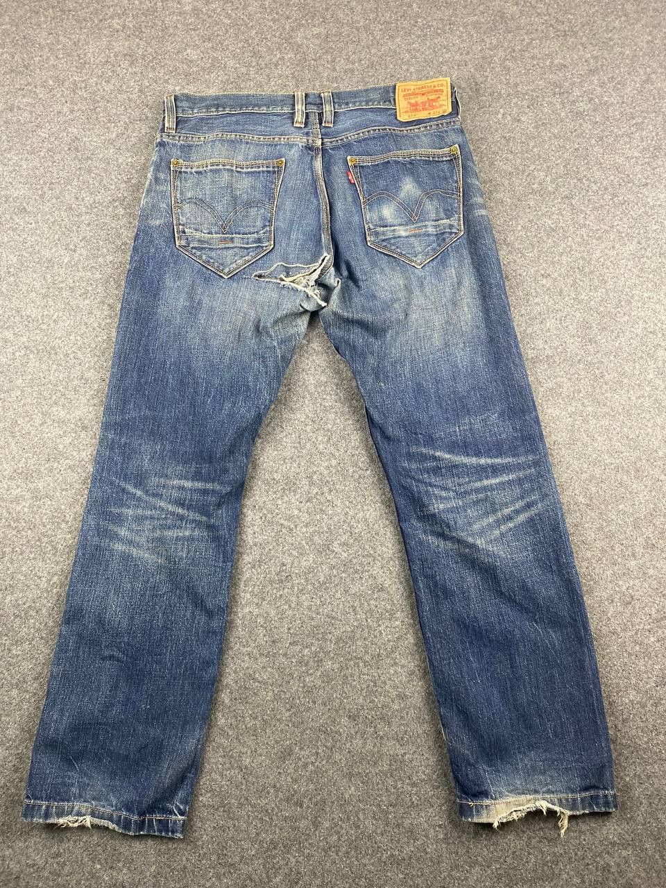 levis 514 slim straight distressed denim