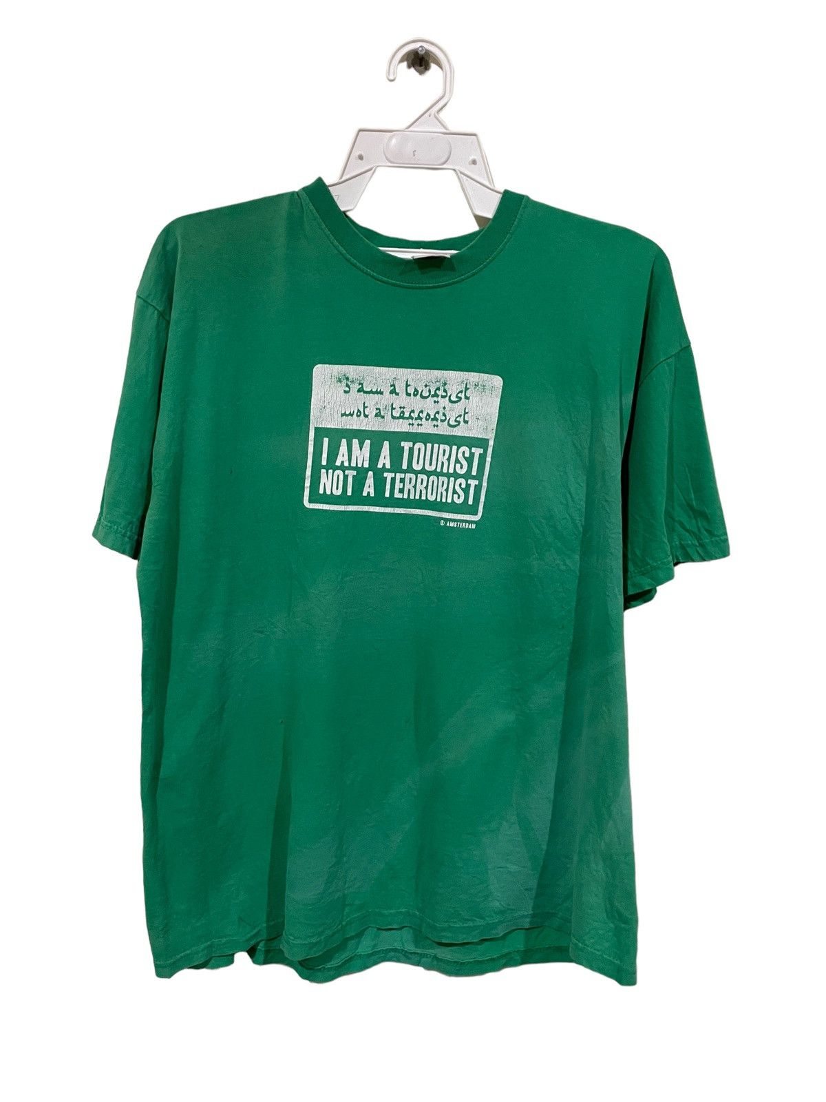 image of Distressed Denim x Humor vintage Statement I Am Tourist Not A Terrorist Tee in Faded Green Distress