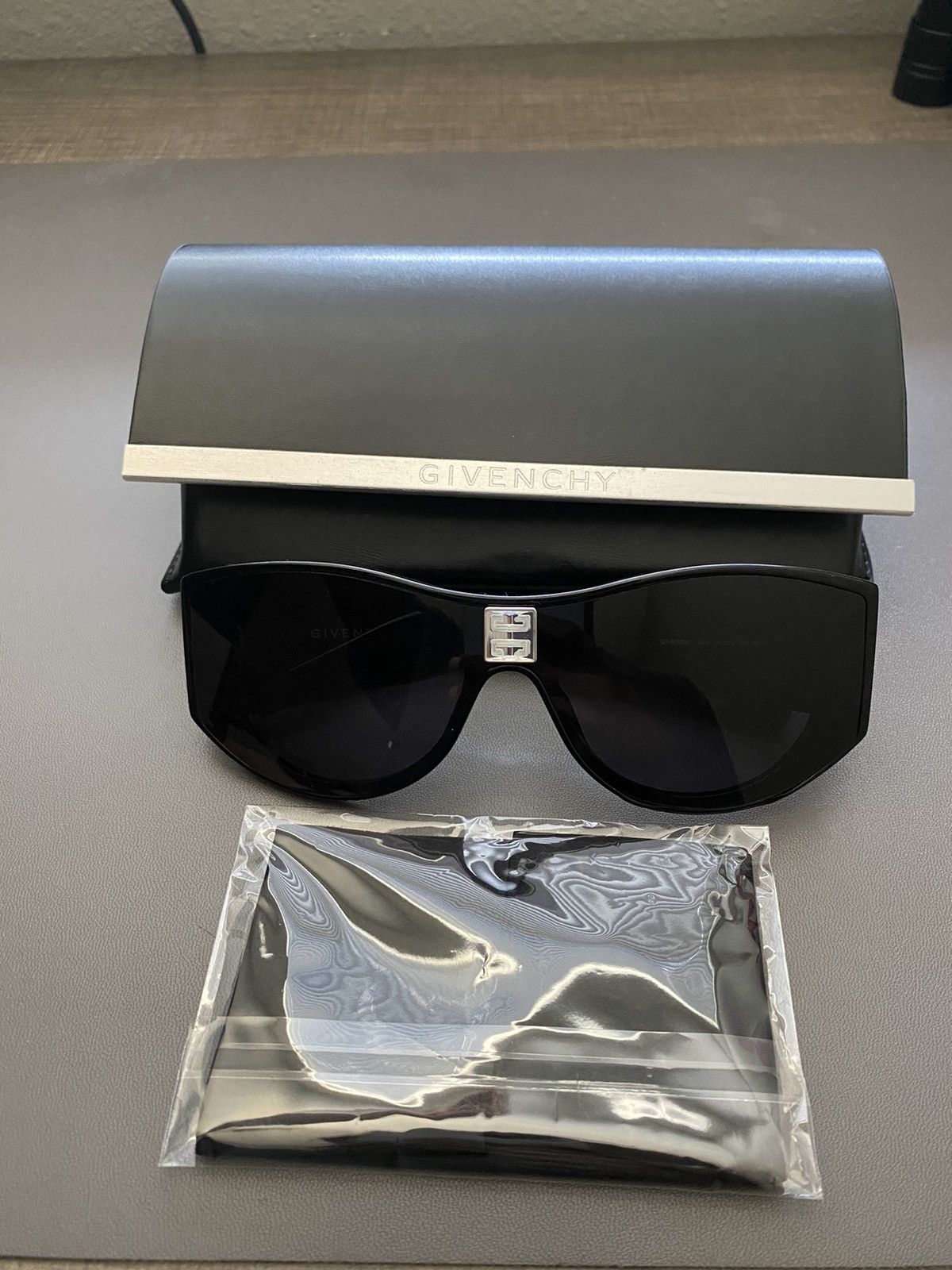 image of Givenchy 4G Logo Oval Sunglasses in Black, Men's