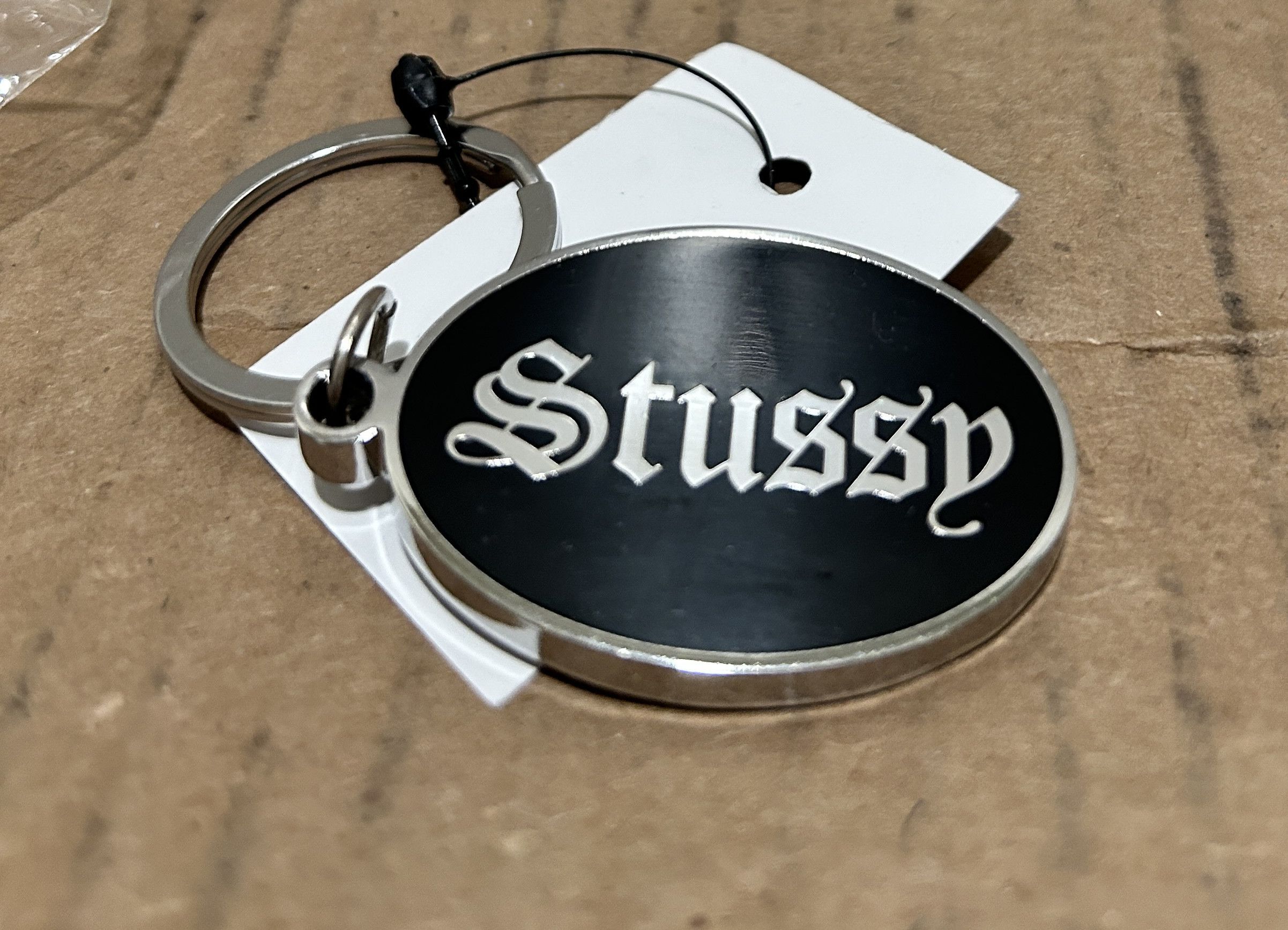 image of Stussy O.e Keychain ​​badge in Black, Men's