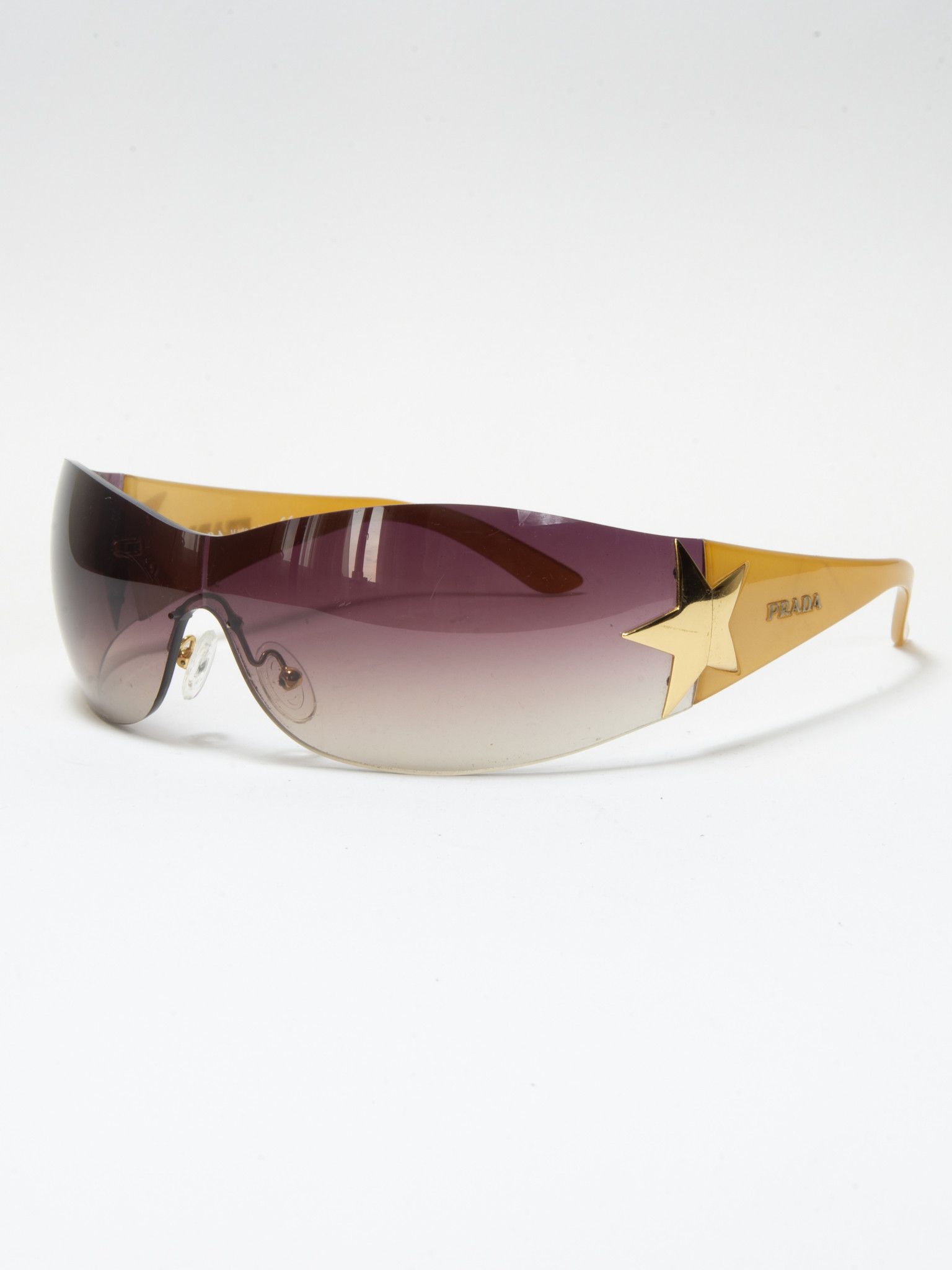 image of Y2K Iconic Prada Star Sunglasses in Beige, Women's