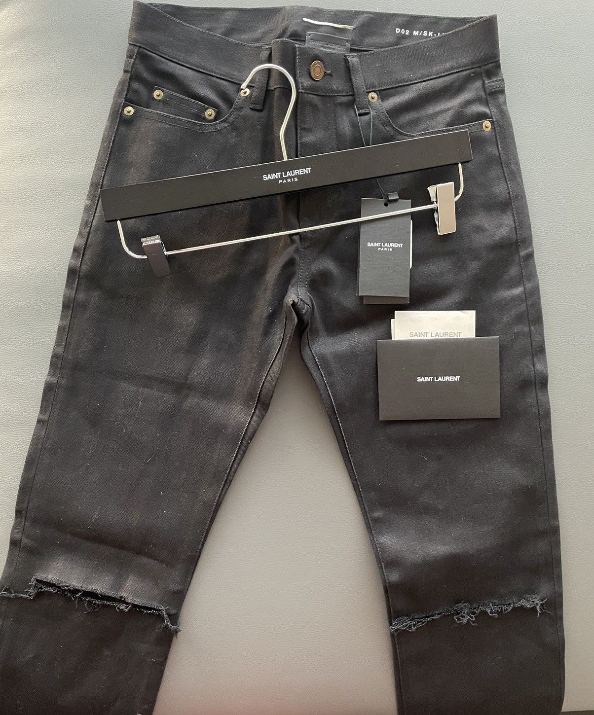 image of Hedi Slimane x Saint Laurent Paris Super Runway Hedi Skinny D02 Ripped Distressed Denim Jeans in Bl