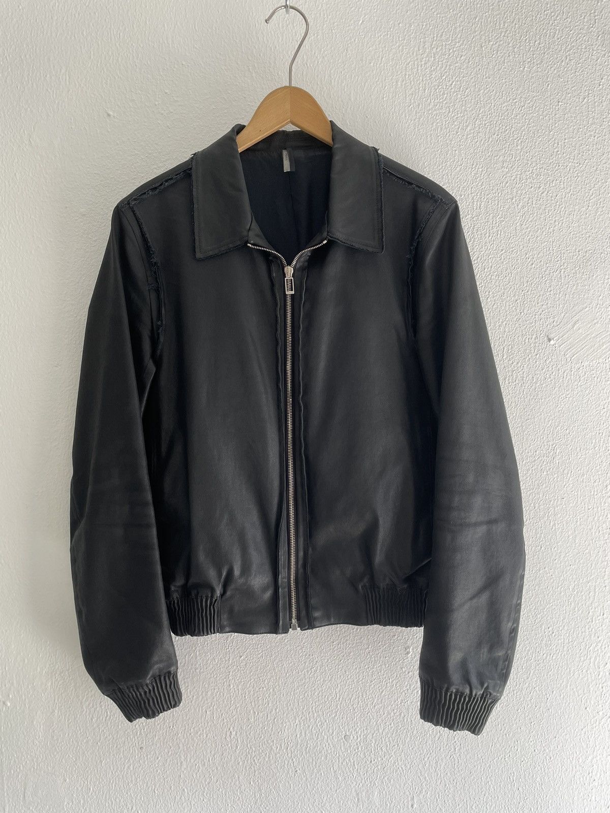 Waxed exposed seam jacket