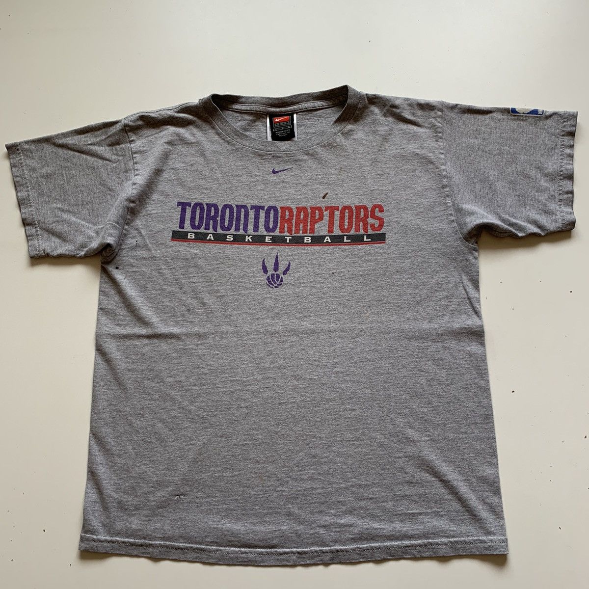 Nike Vintage 1990s Toronto Raptors NBA Nike Center Swoosh T Shirt | Grailed