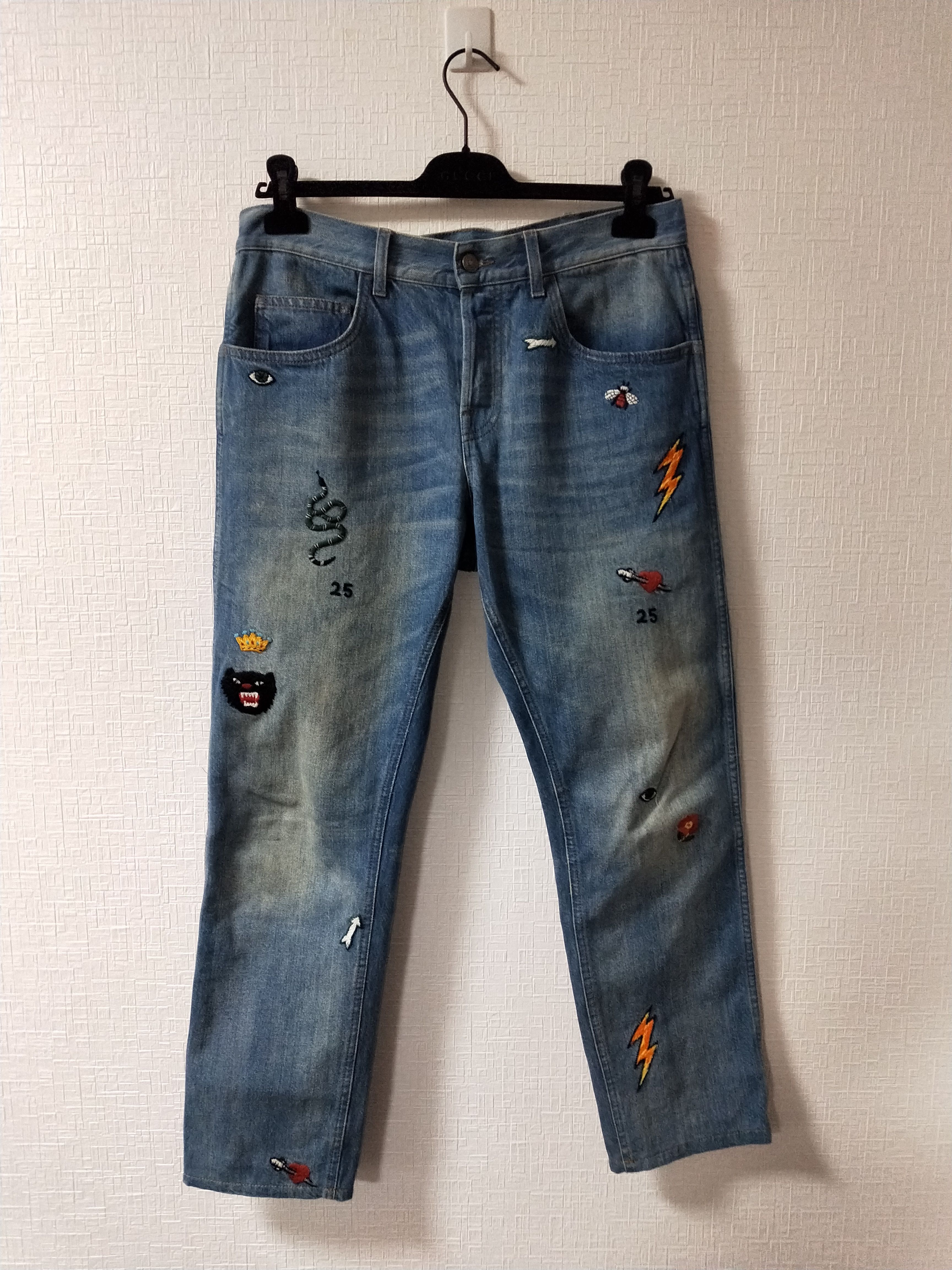 Pre-owned Gucci Symbols Tapered Jeans In Indigo