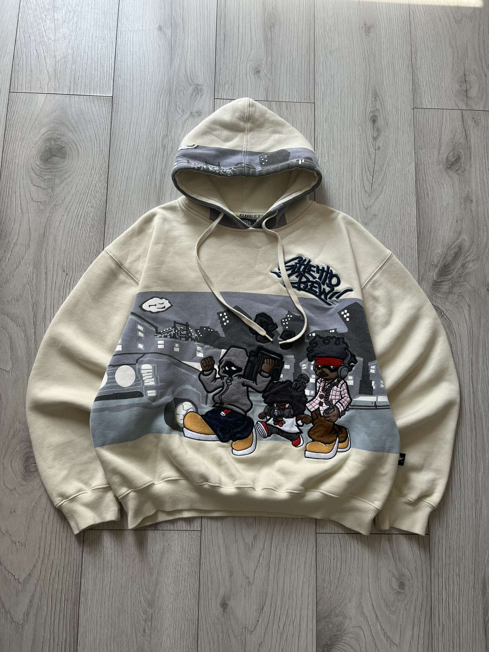 image of Vintage Skate Hoodie With Hip-Hop Patterns Streetwear Fubu in Cream, Women's (Size Small)