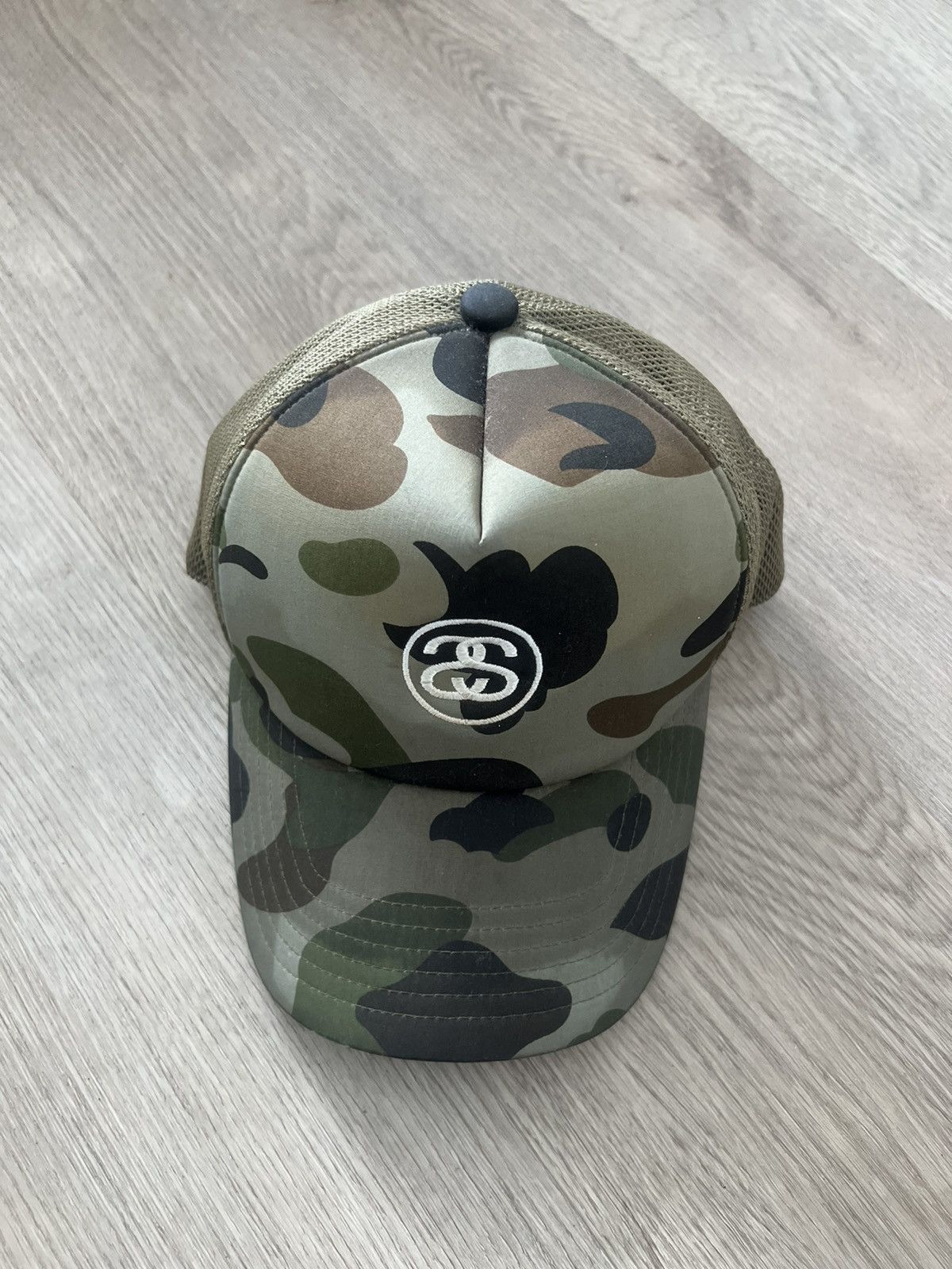 image of Bape x Stussy Trucker Hat in Green, Men's