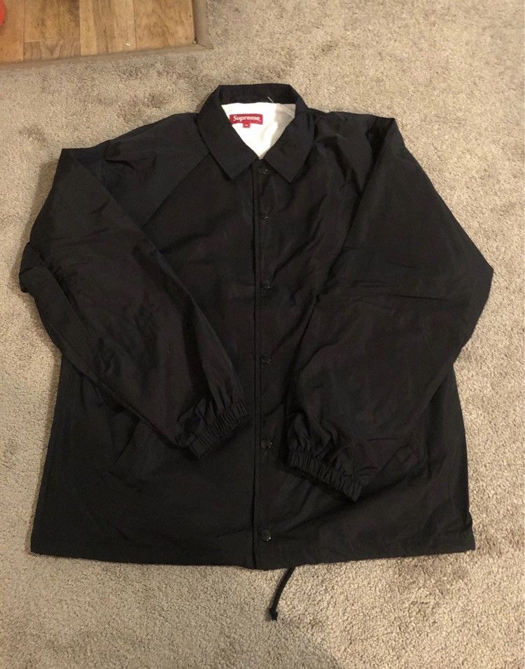 supreme nike world famous jacket