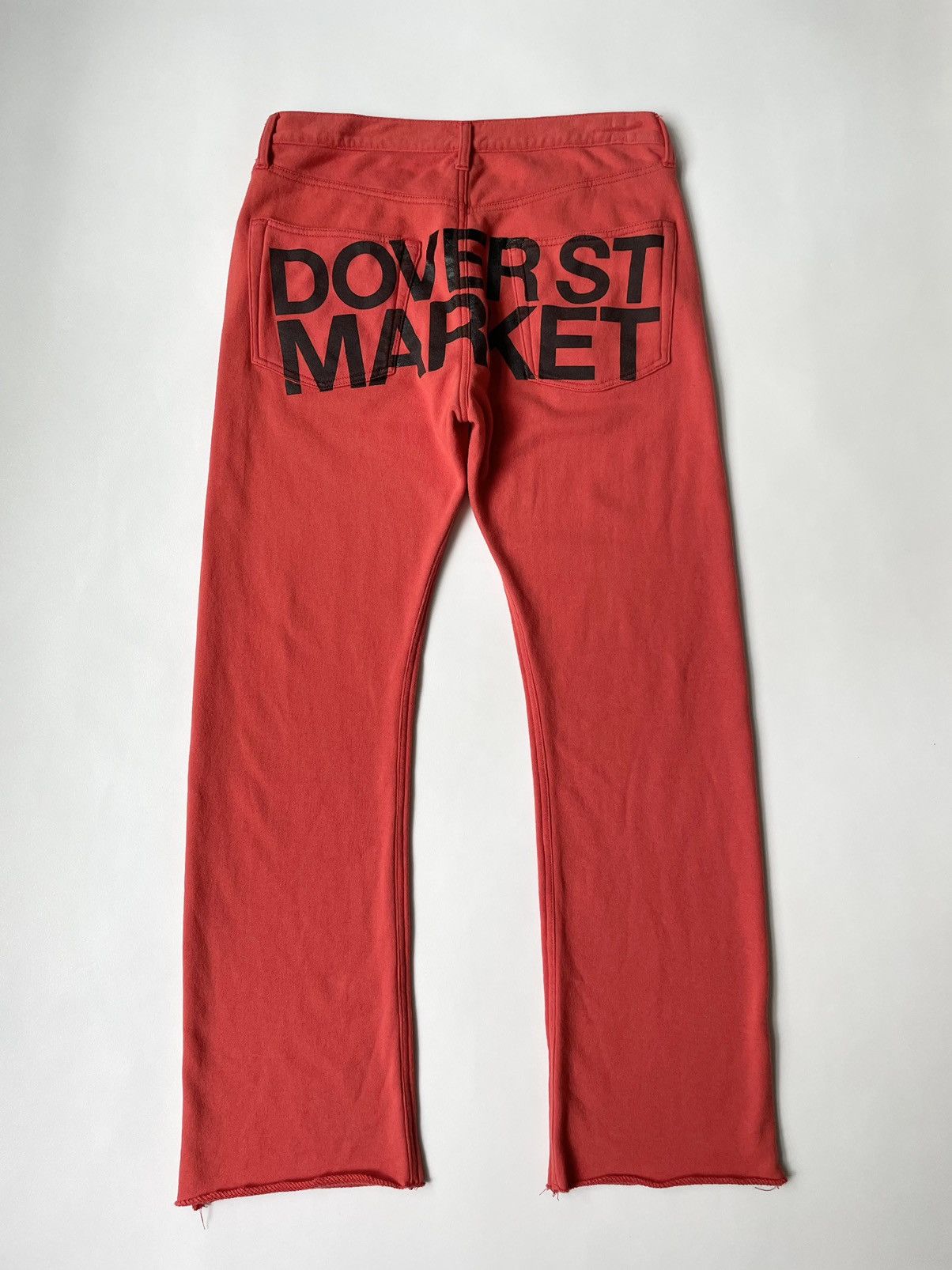 image of Comme Des Garcons x Dover Street Market Back Logo Flared Leg Sweatpants in Orange/Black (Size 34)