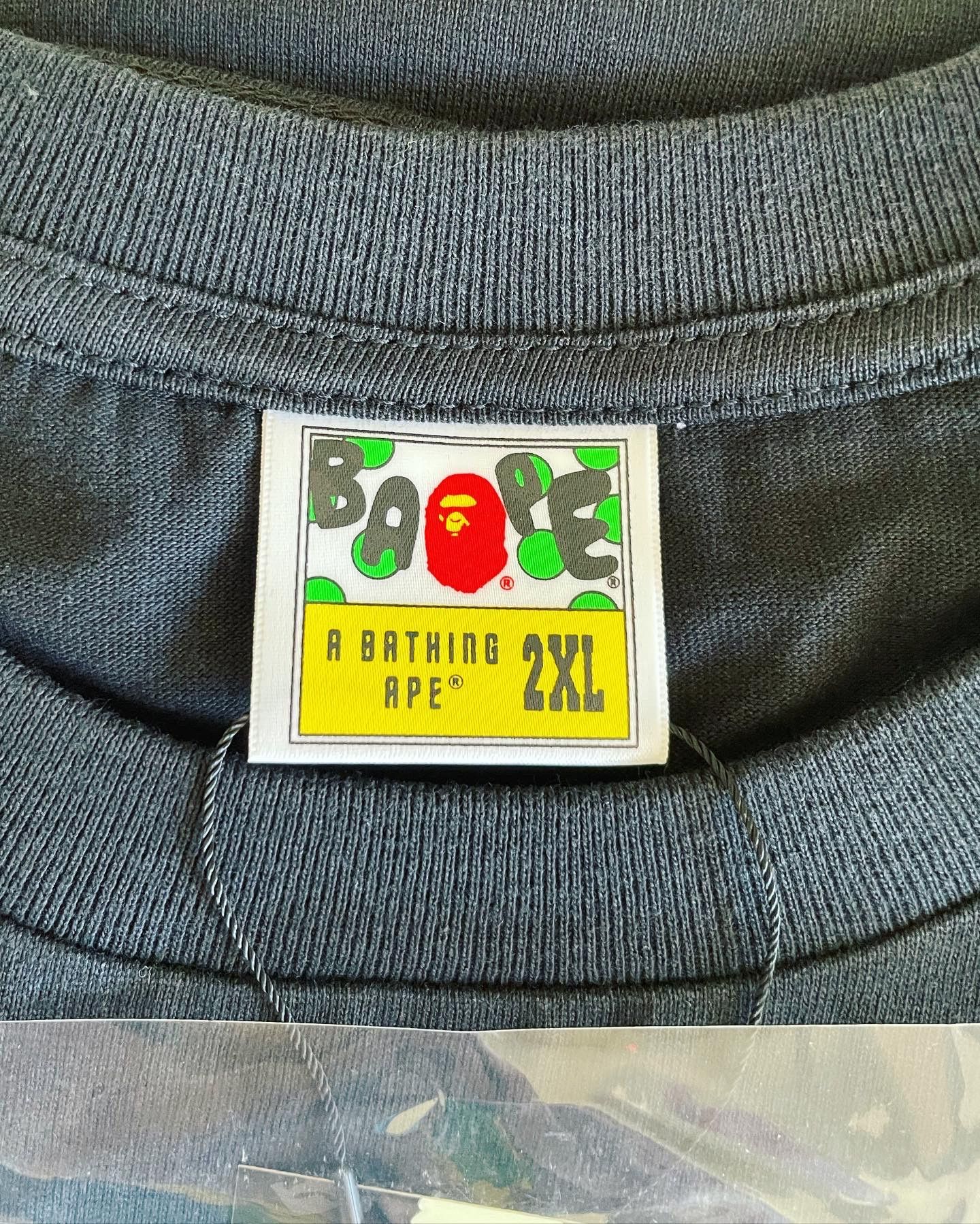 Bape BAPE TEXT CODE CAMO COLLEGE TEE Size US XXL / EU 58 / 5 - 5 Thumbnail