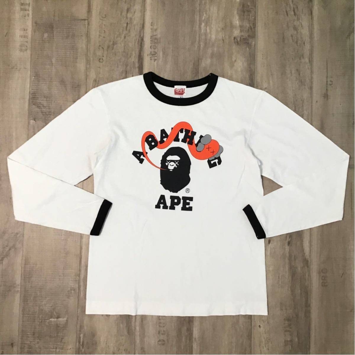 Bape × Kaws BAPE × kaws bendy College logo long sleeve T-shirt Size US S / EU 44-46 / 1 - 1 Thumbnail
