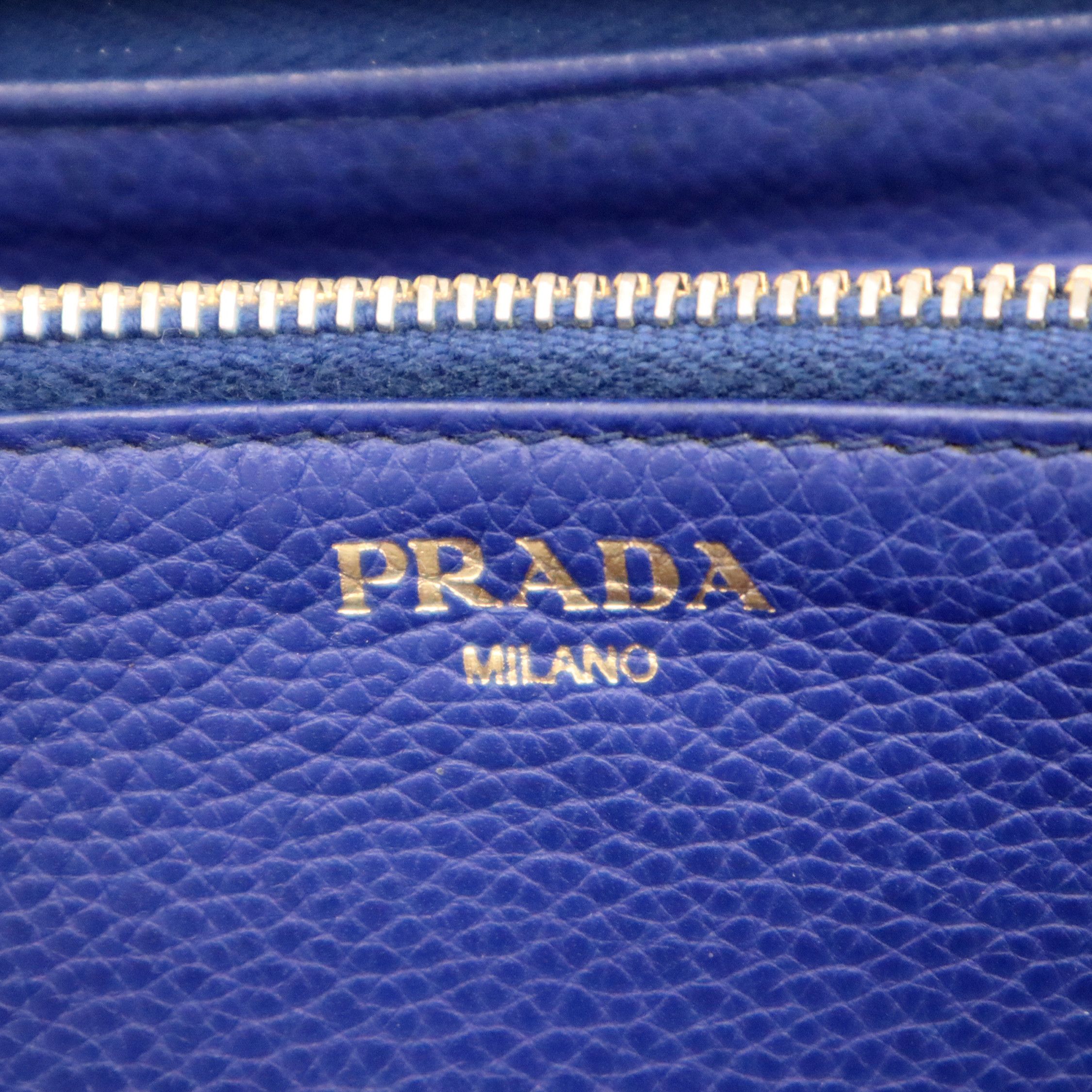 Prada Leather Round Zipper Long Wallet Blue