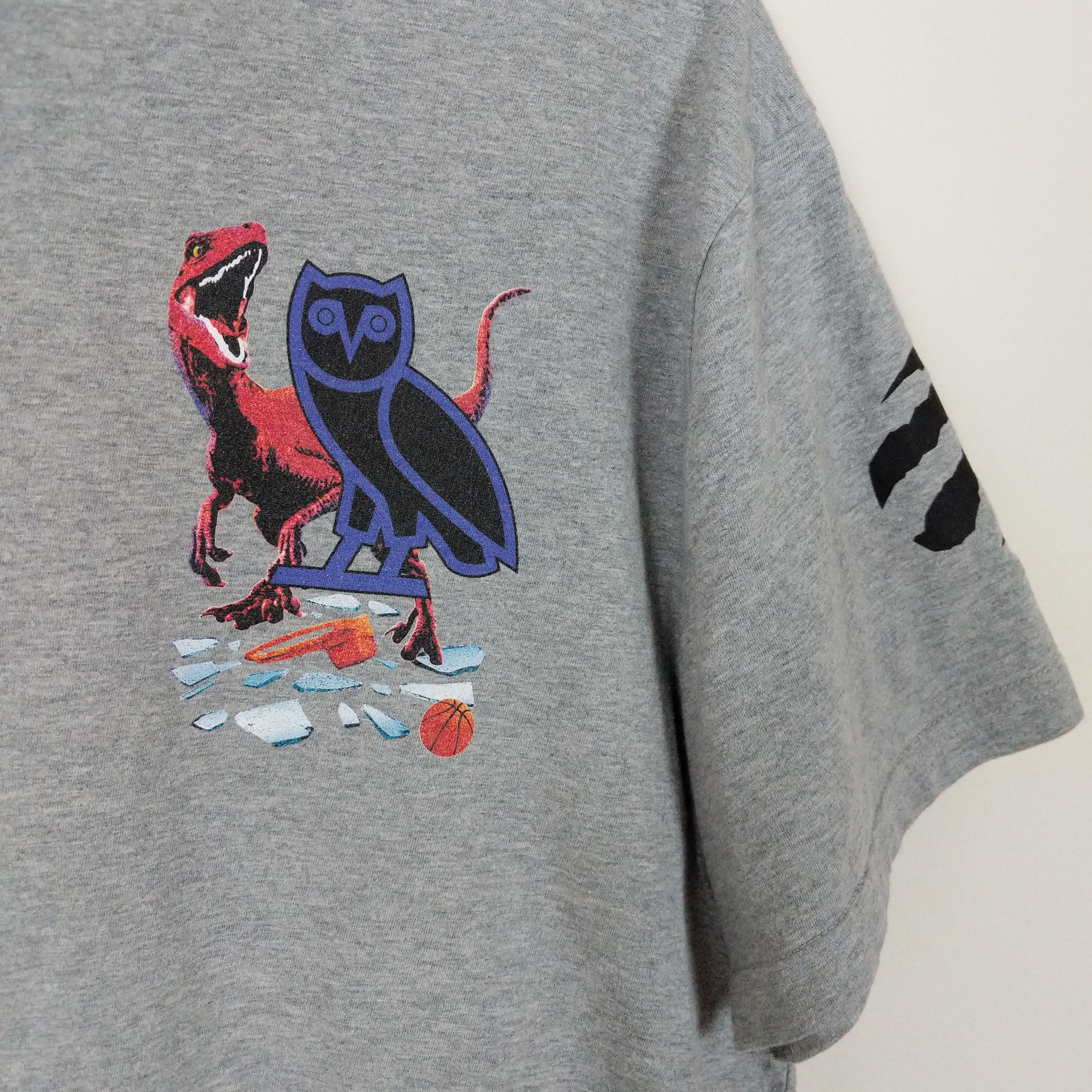 NBA × October's Very Own OVO Jurassic Park Toronto Raptors Shattered Backboard Tee Size US M / EU 48-50 / 2 - 3 Thumbnail