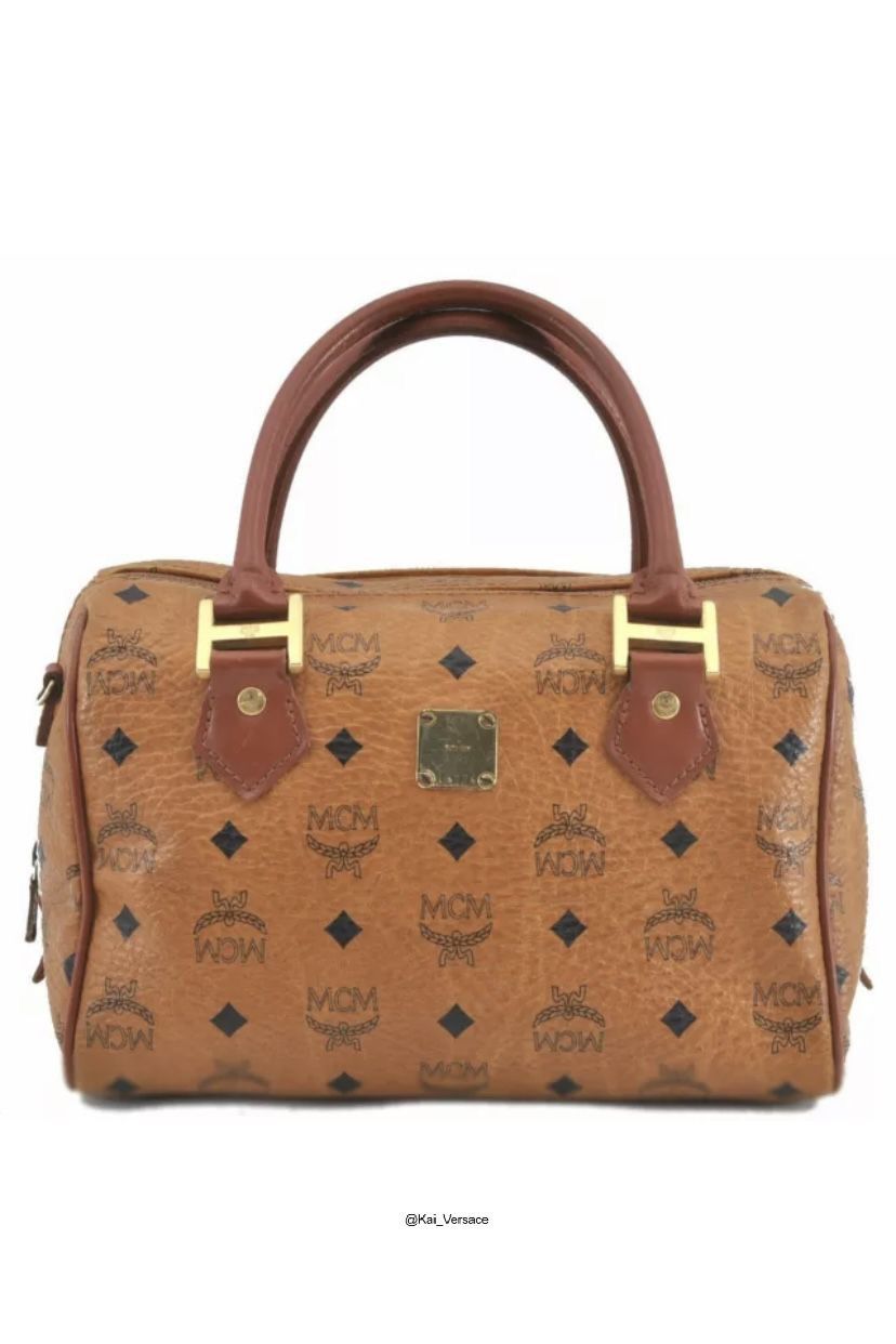 MCM Monogram Mini Hand Bag in Brown, Men's