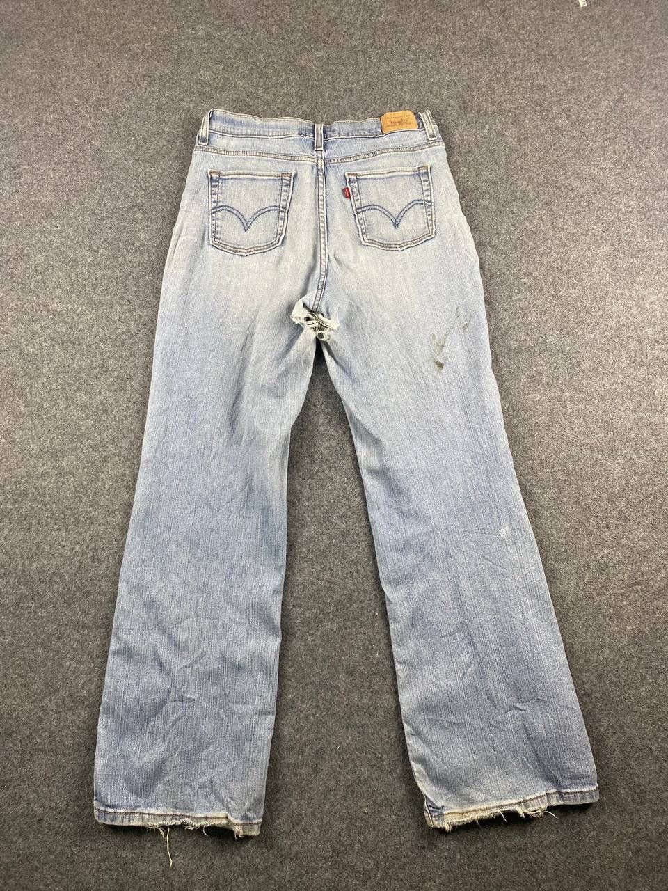 image of 512 Perfectly Slimming Bootcut Distressed Denim in Light Blue, Women's (Size 32)