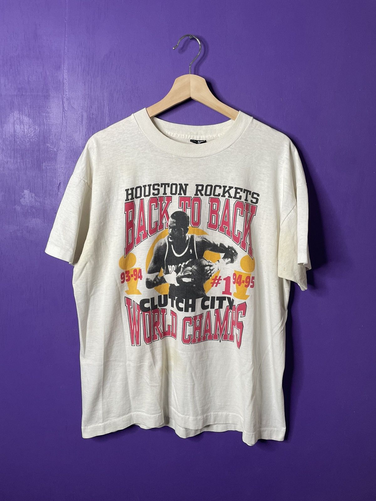 Image of NBA x Vintage Houston Rockets Hakeem Olajuwon Champs T-Shirt in White, Men's (Size XL)