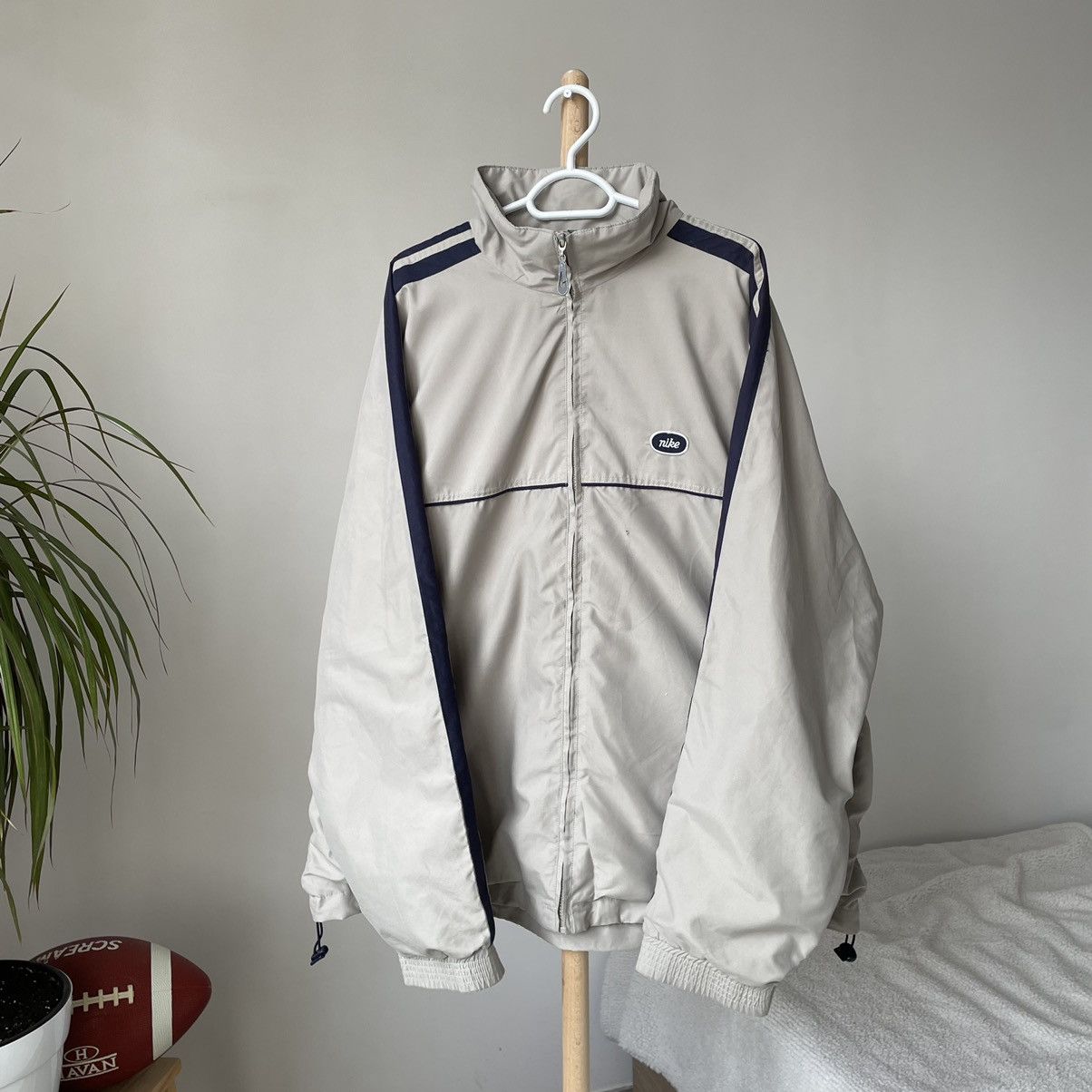 image of Nike Light Jacket in Beige, Men's (Size Large)
