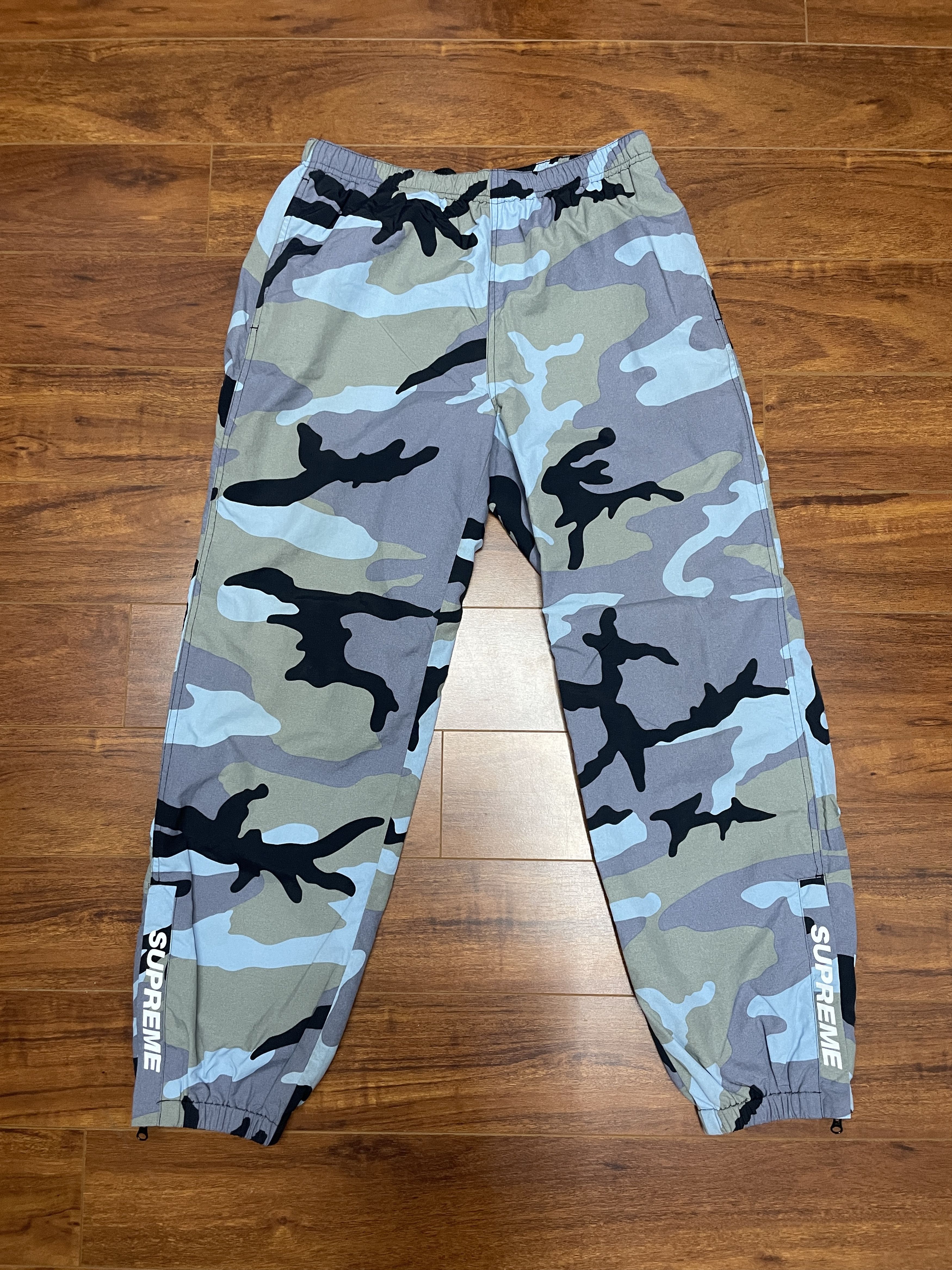 Supreme warm up pants camo online