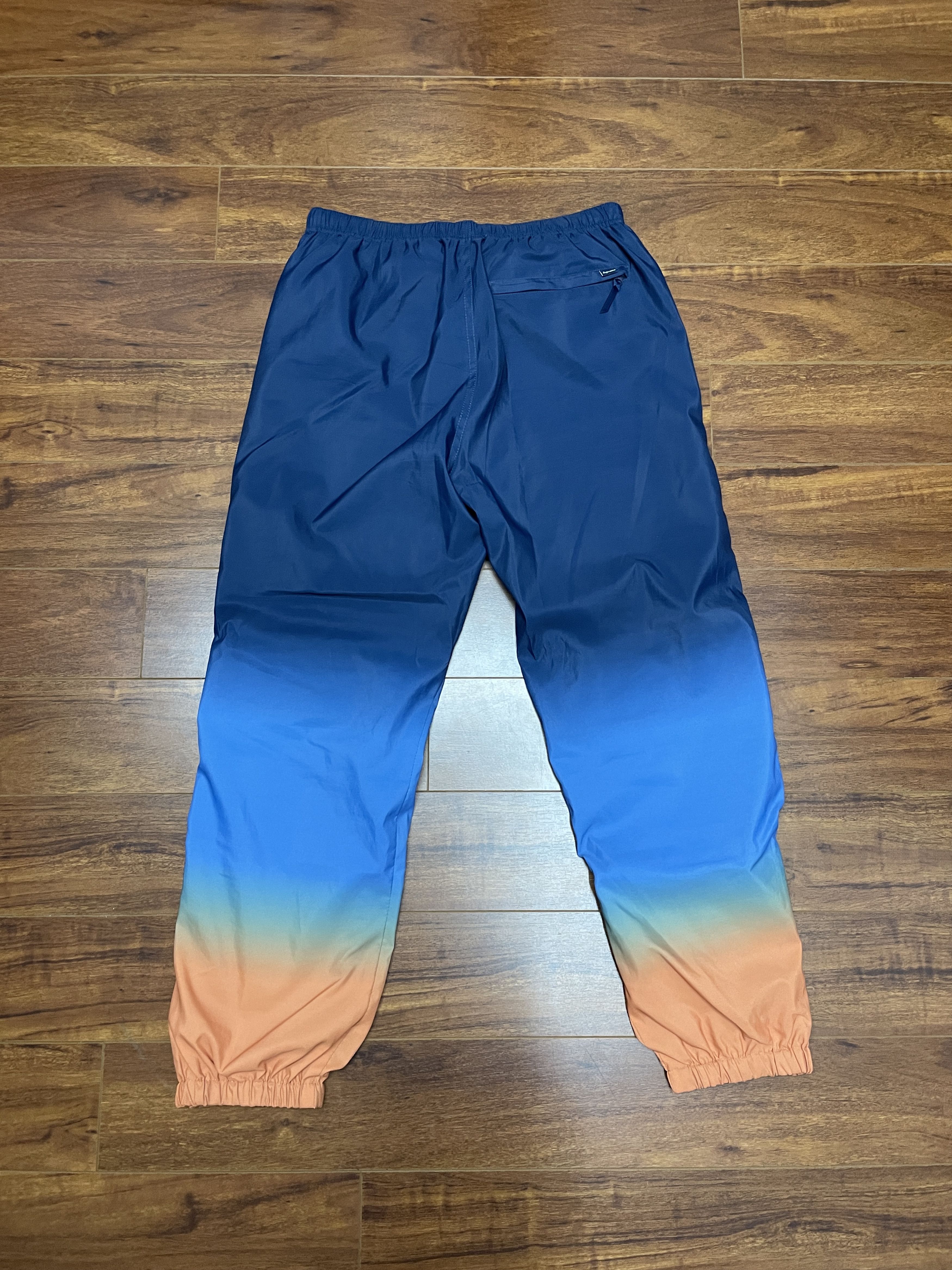 Supreme gradient track pant navy sales