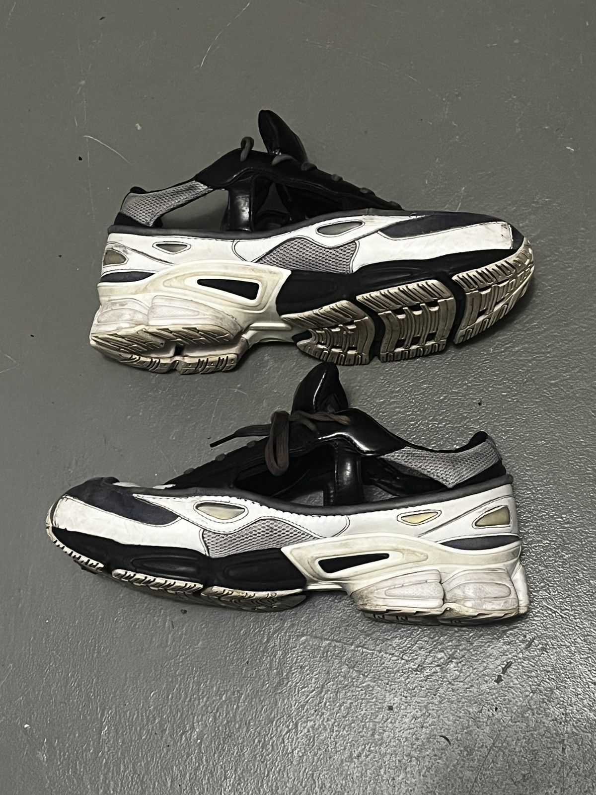 Raf Simons x Replicant Ozweego Black Cream