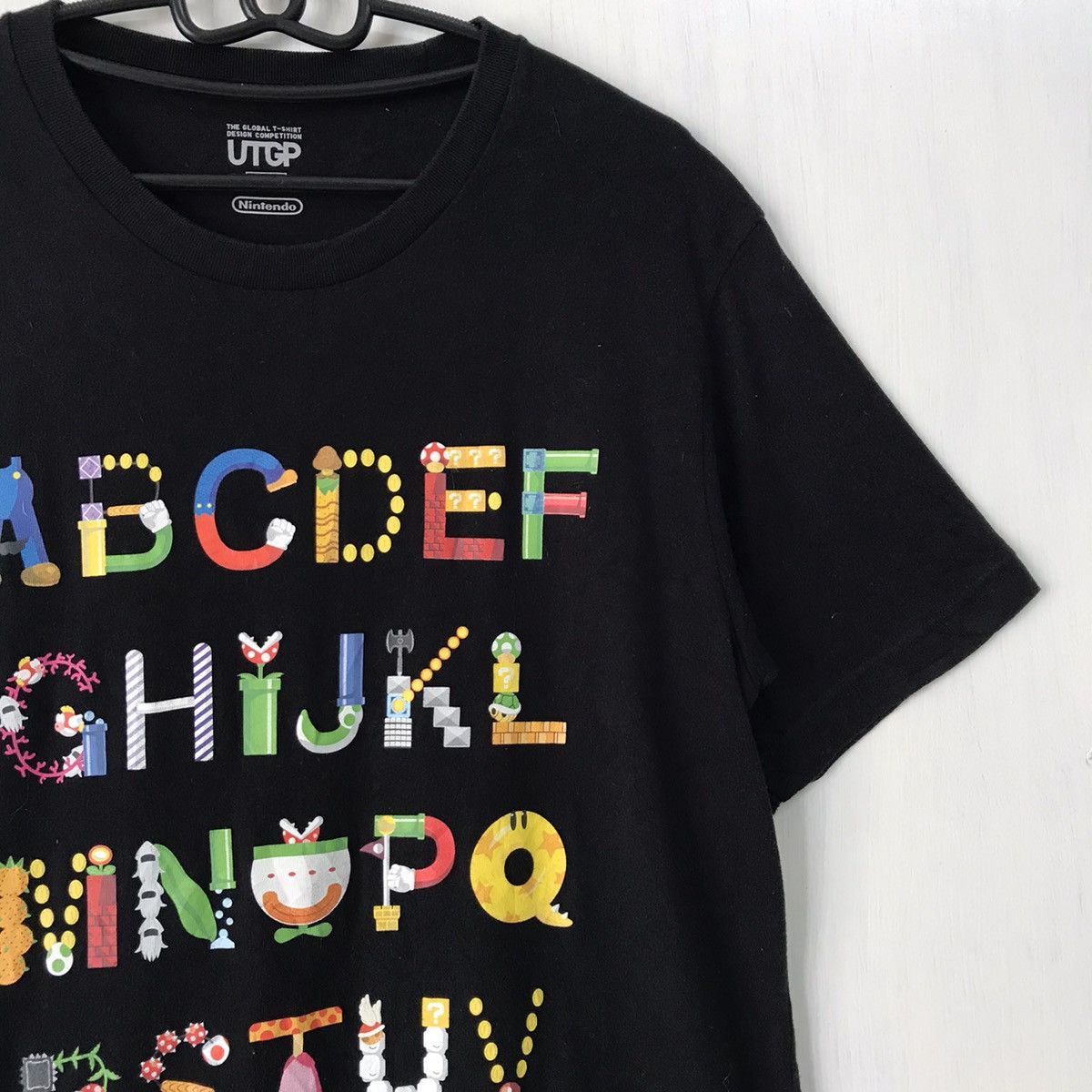 Nintendo × Uniqlo The global tshirt design competition nintendo tshirt Size US M / EU 48-50 / 2 - 4 Thumbnail