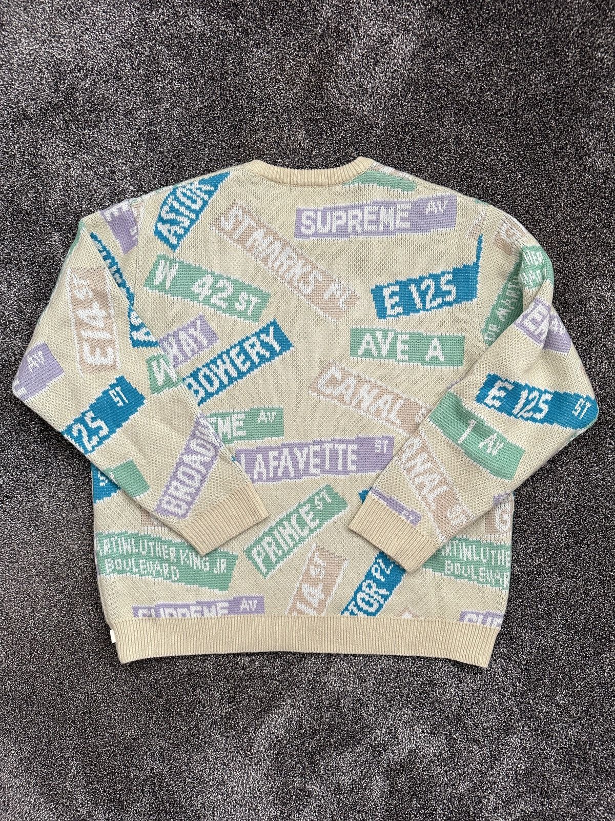 Supreme street sign shops sweater ss21