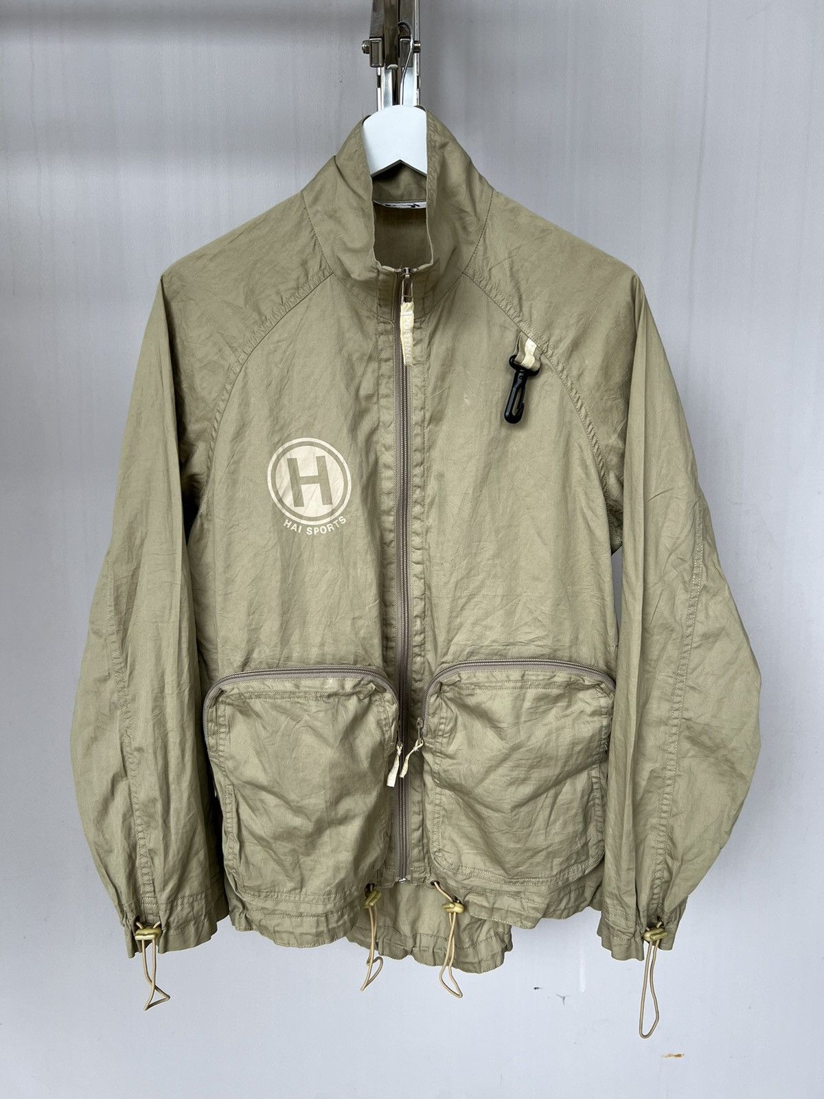 image of Hai Sporting Gear x Issey Miyake Hai Sporting 3D Analog Multi Pocket Utility Cargo Jacket in Khaki 