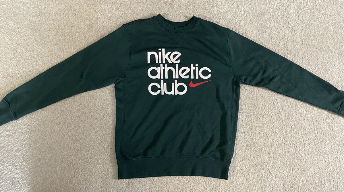 Nike Athletic Club retro logo crew neck sweatshirt in dark green