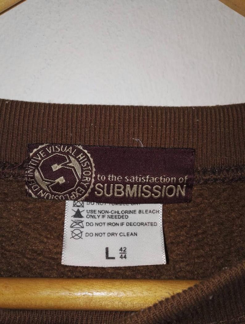 Designer × Studio D'Artisan × Vintage SUBMISSION Executive Model big Logo copyright 1995 (ss307) Size US L / EU 52-54 / 3 - 7 Thumbnail