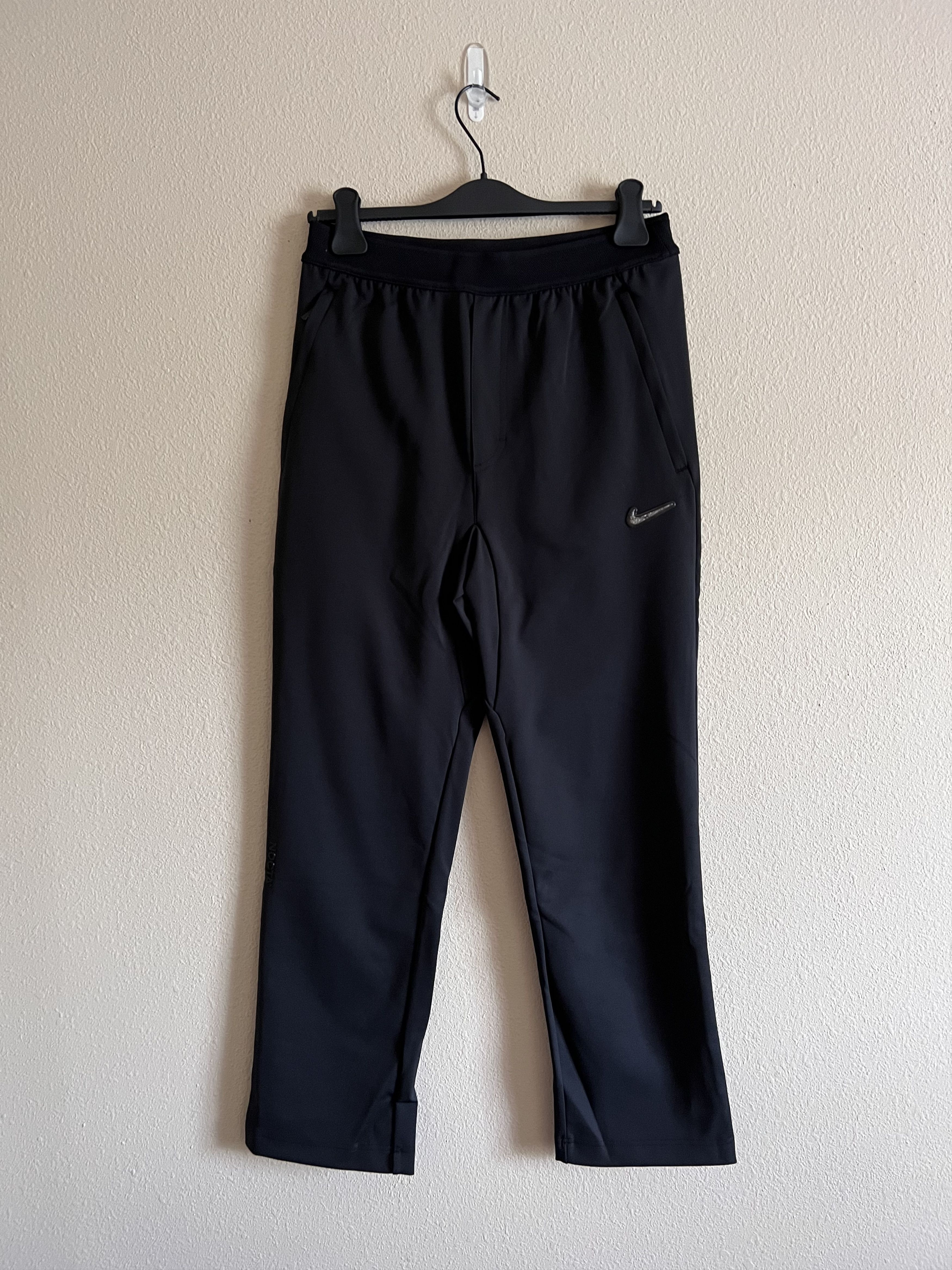 Nike Nike NOCTA Swarovski Crystal Swoosh Pants in Black | Grailed