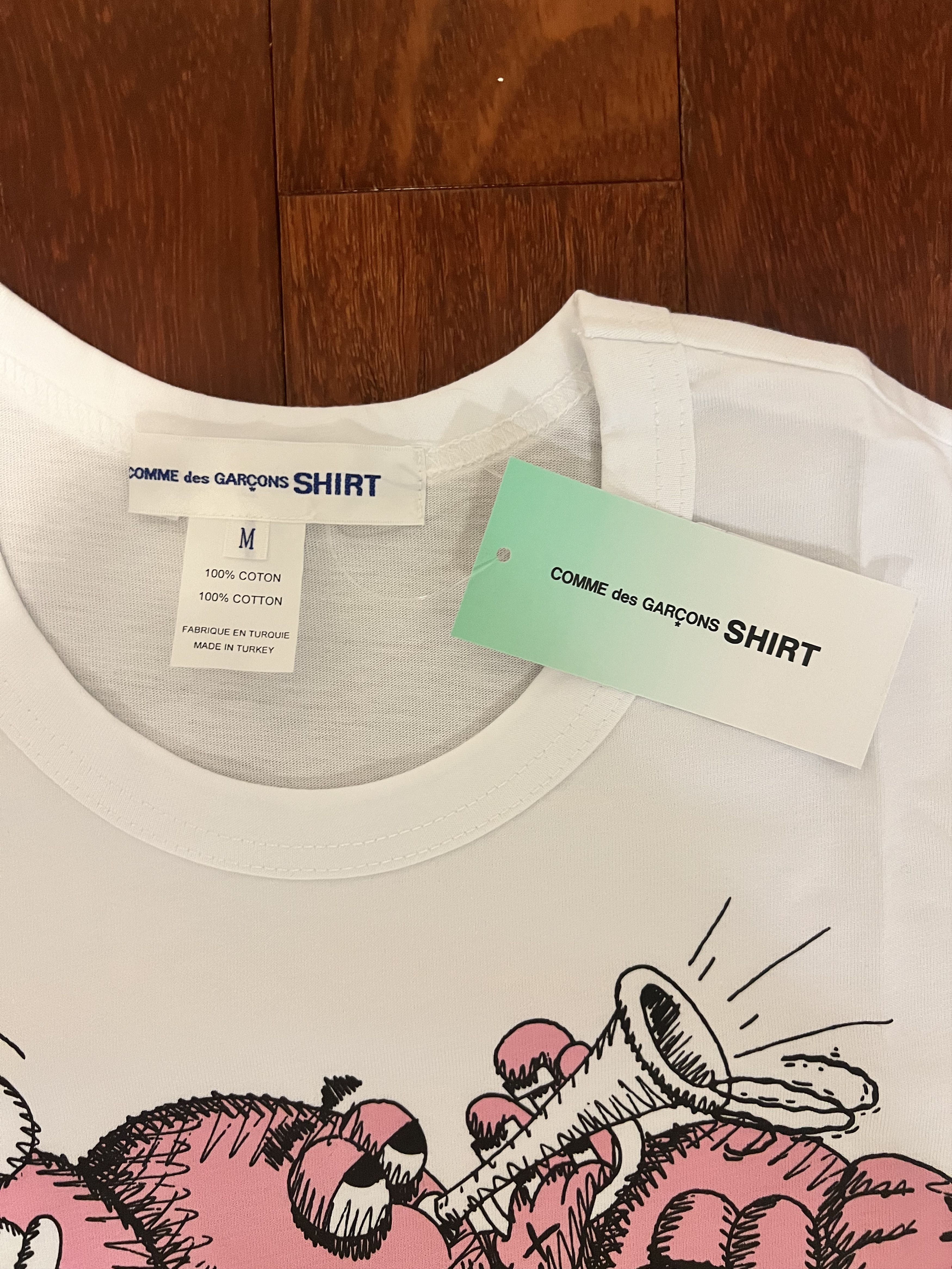 Comme des Garcons SHIRT × Kaws 💚 Comme des Garçons CDG Shirt x KAWS White Tee NEW Size US M / EU 48-50 / 2 - 4 Thumbnail