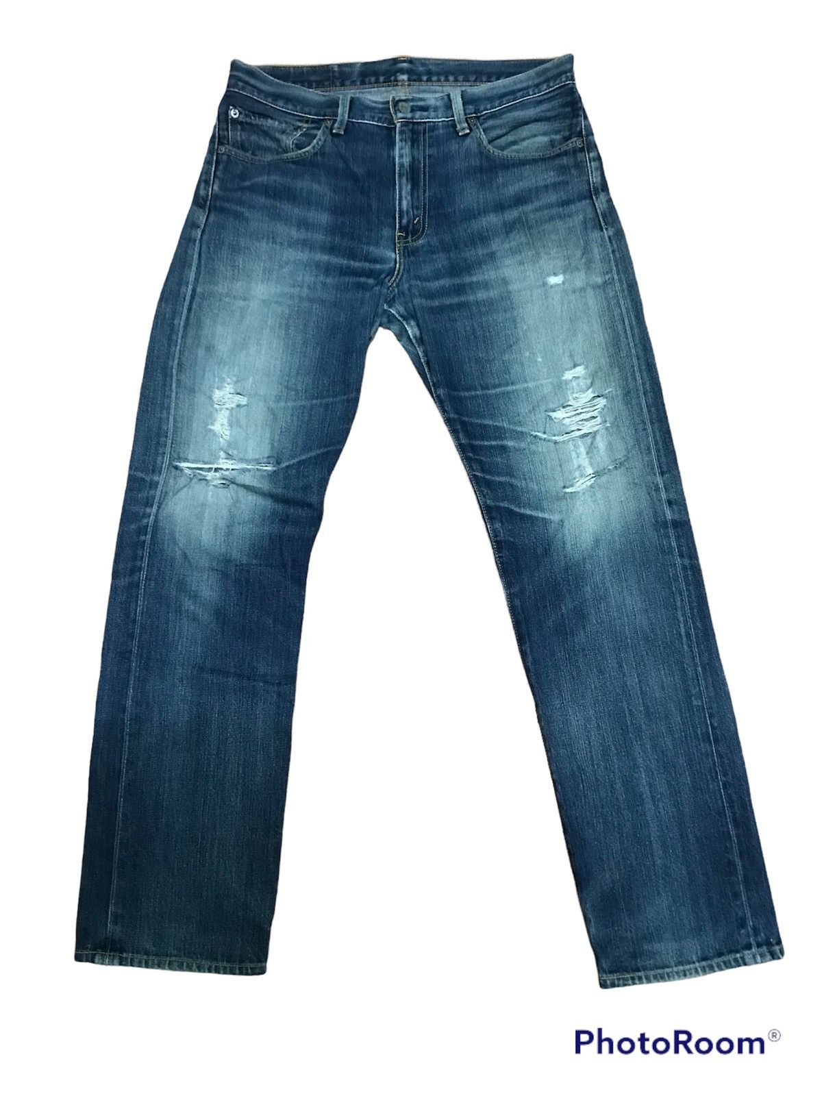 “Vintage Distressed Light Blue Denim Jeans – Faded Wash