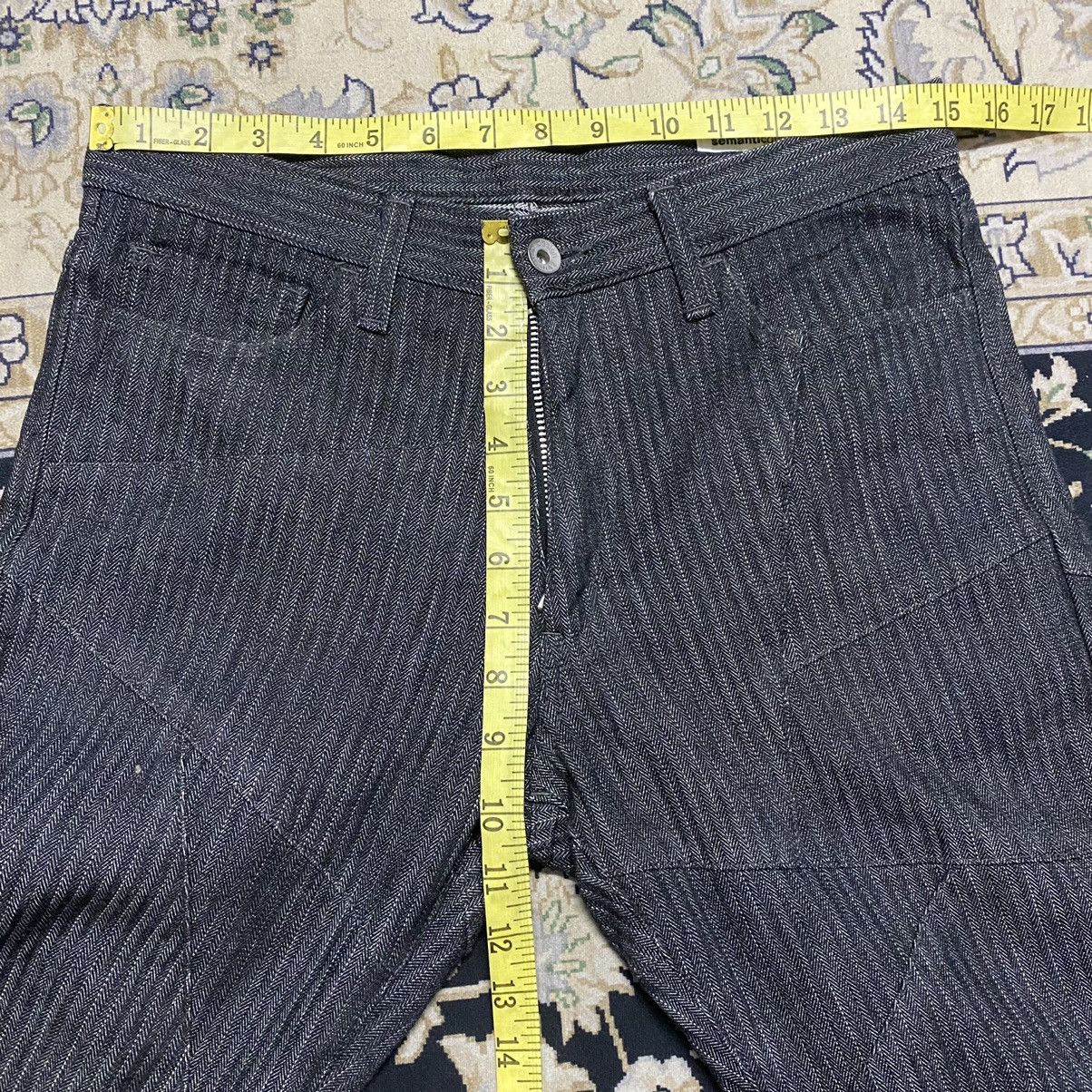 SEMANTIC DESIGN Reconstructed Denim Flare Jeans