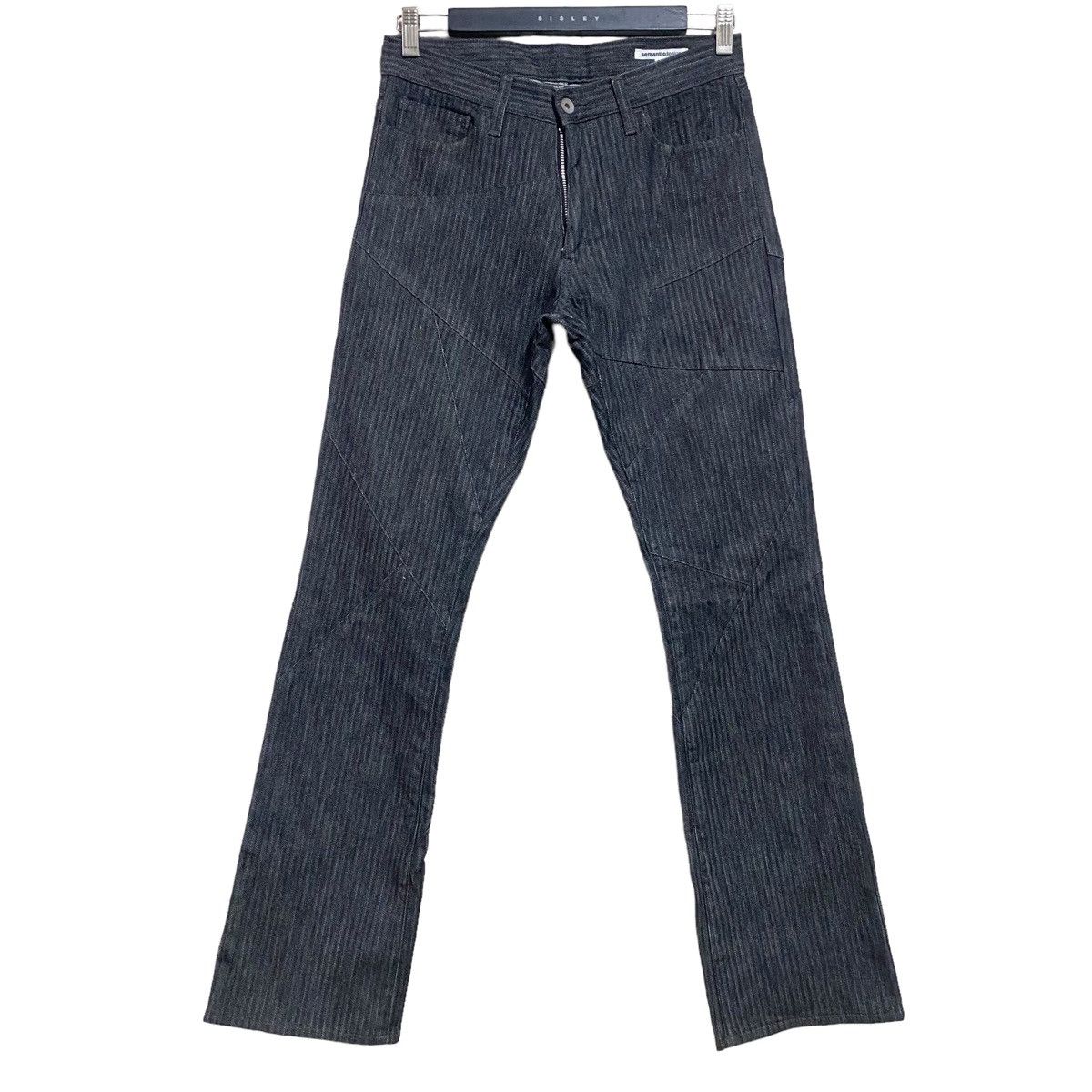 SEMANTIC DESIGN Reconstructed Denim Flare Jeans