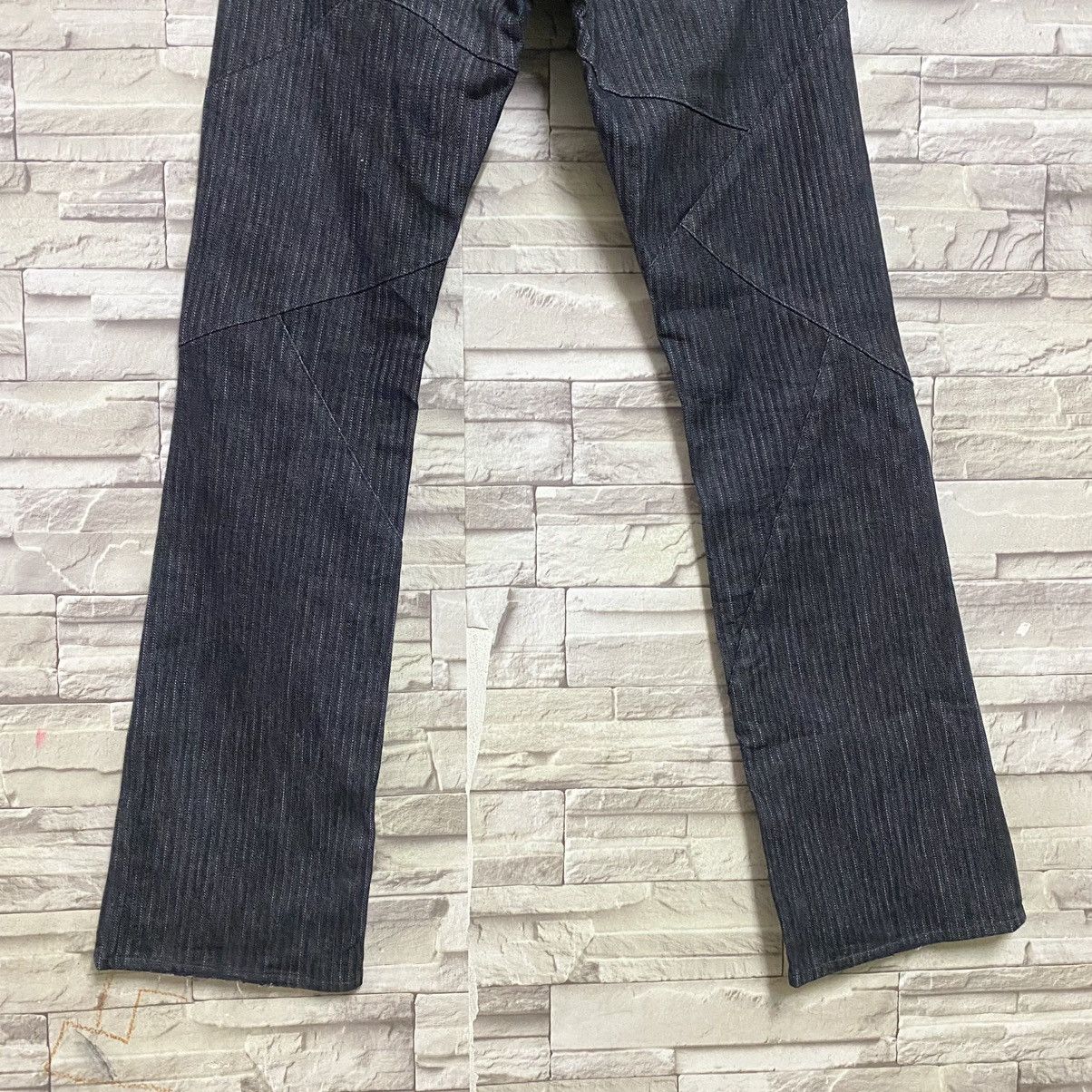 SEMANTIC DESIGN Reconstructed Denim Flare Jeans