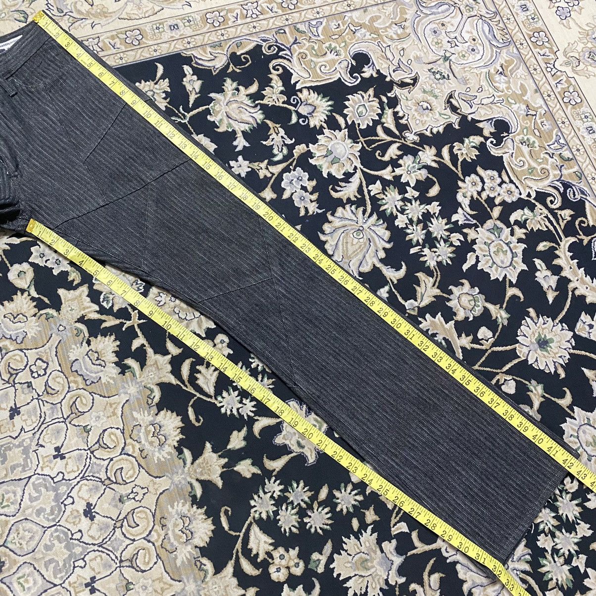 SEMANTIC DESIGN Reconstructed Denim Flare Jeans
