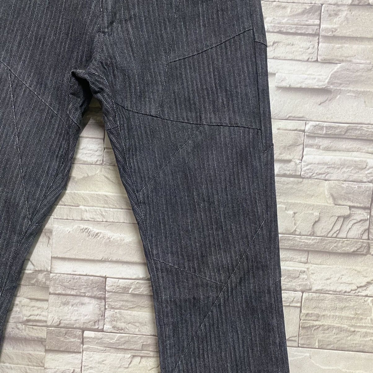 SEMANTIC DESIGN Reconstructed Denim Flare Jeans
