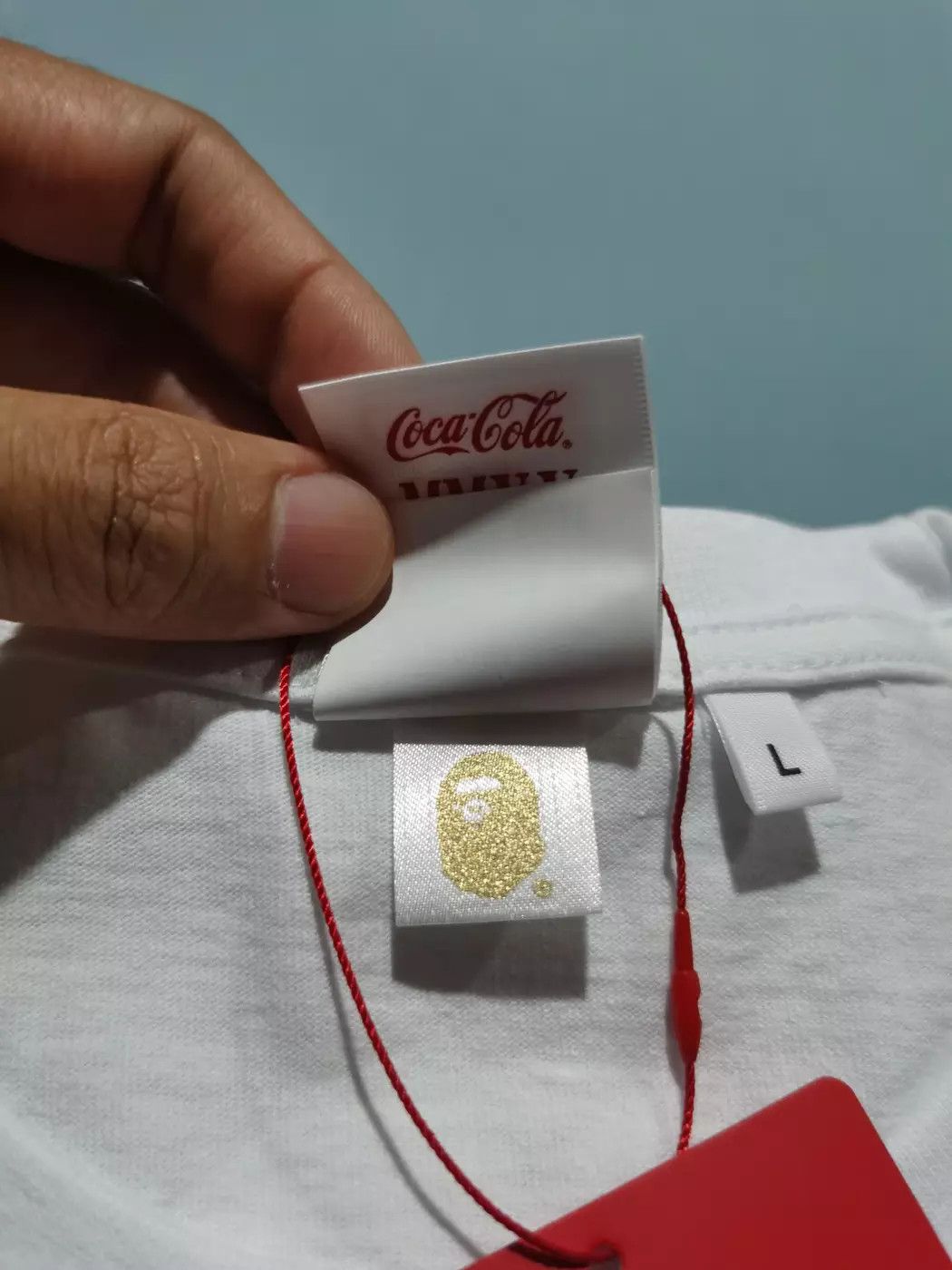 Bape × Coca Cola Bape X Coca Cola Milo BMX Tee Size US L / EU 52-54 / 3 - 5 Thumbnail