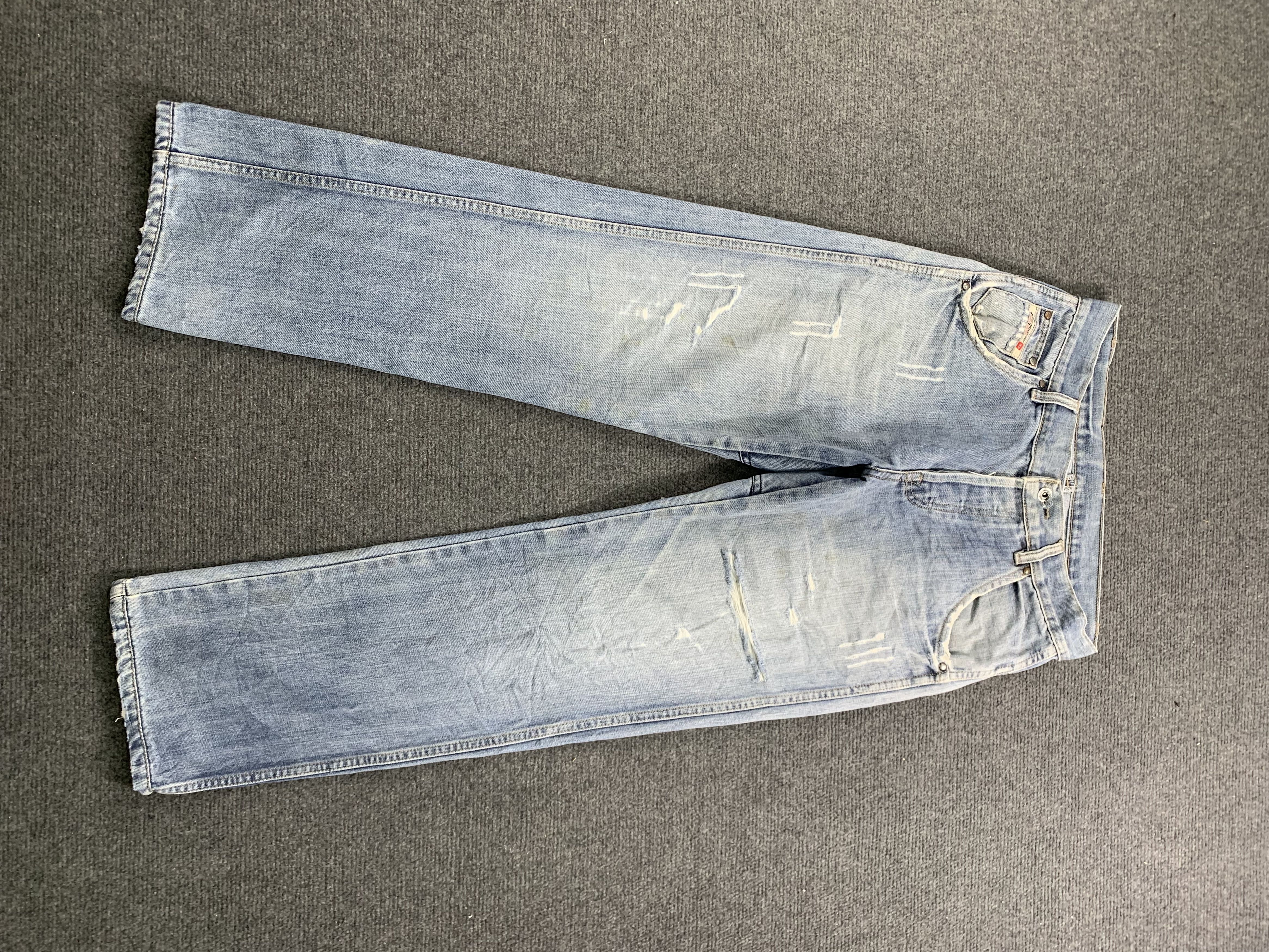 image of Distressed Diesel Industry Faded Blue Jeans in Blue Denim, Men's (Size 32)